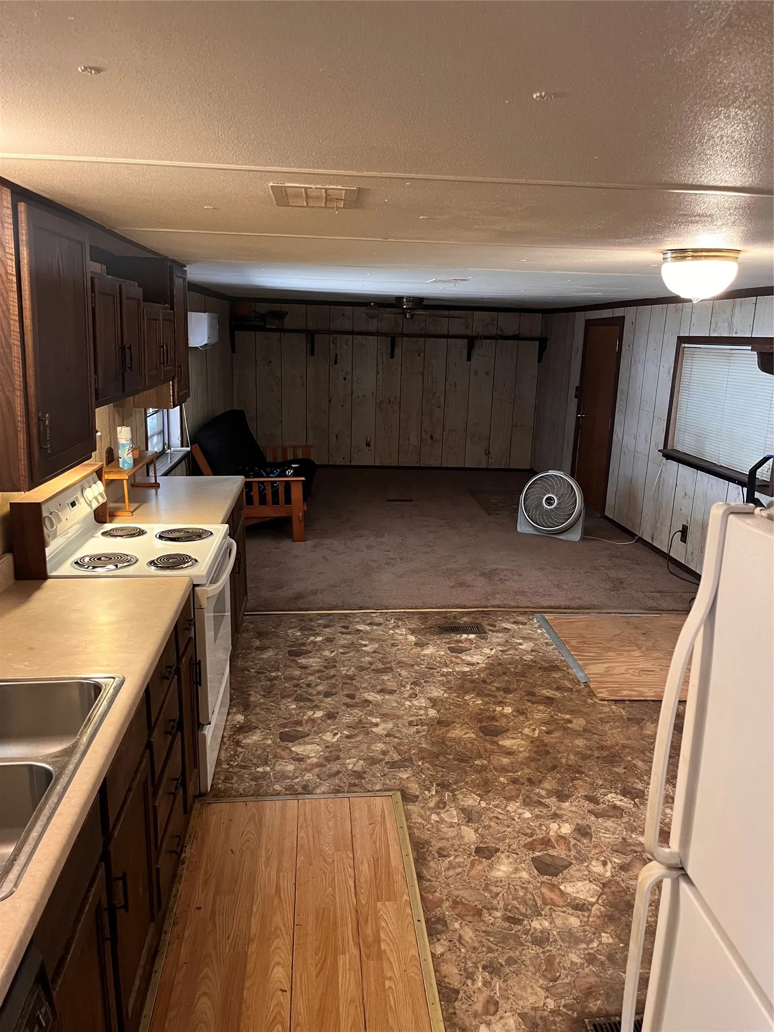 kitchen opens into dining and living room