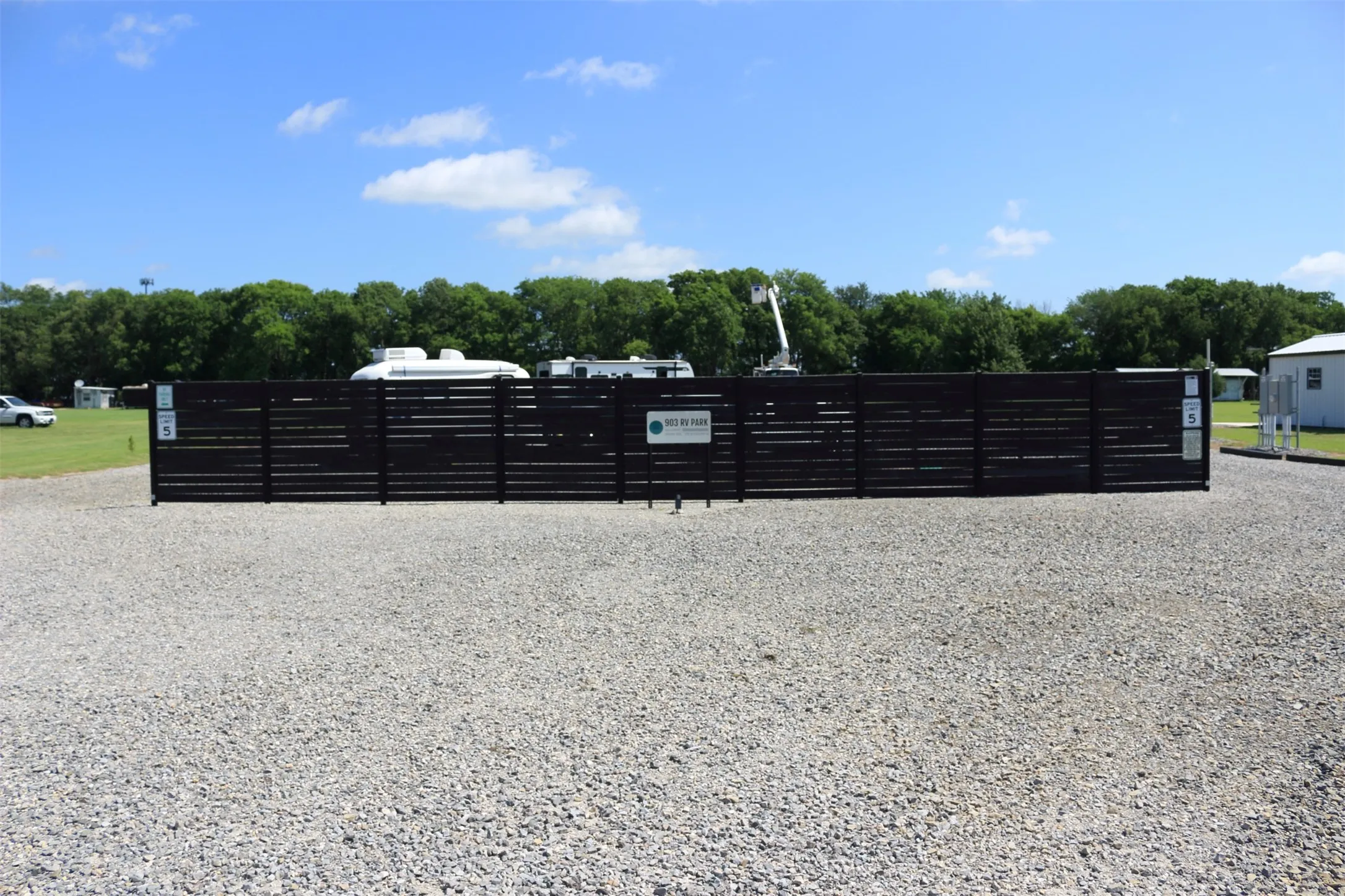 Privacy fence at front of the RV park
