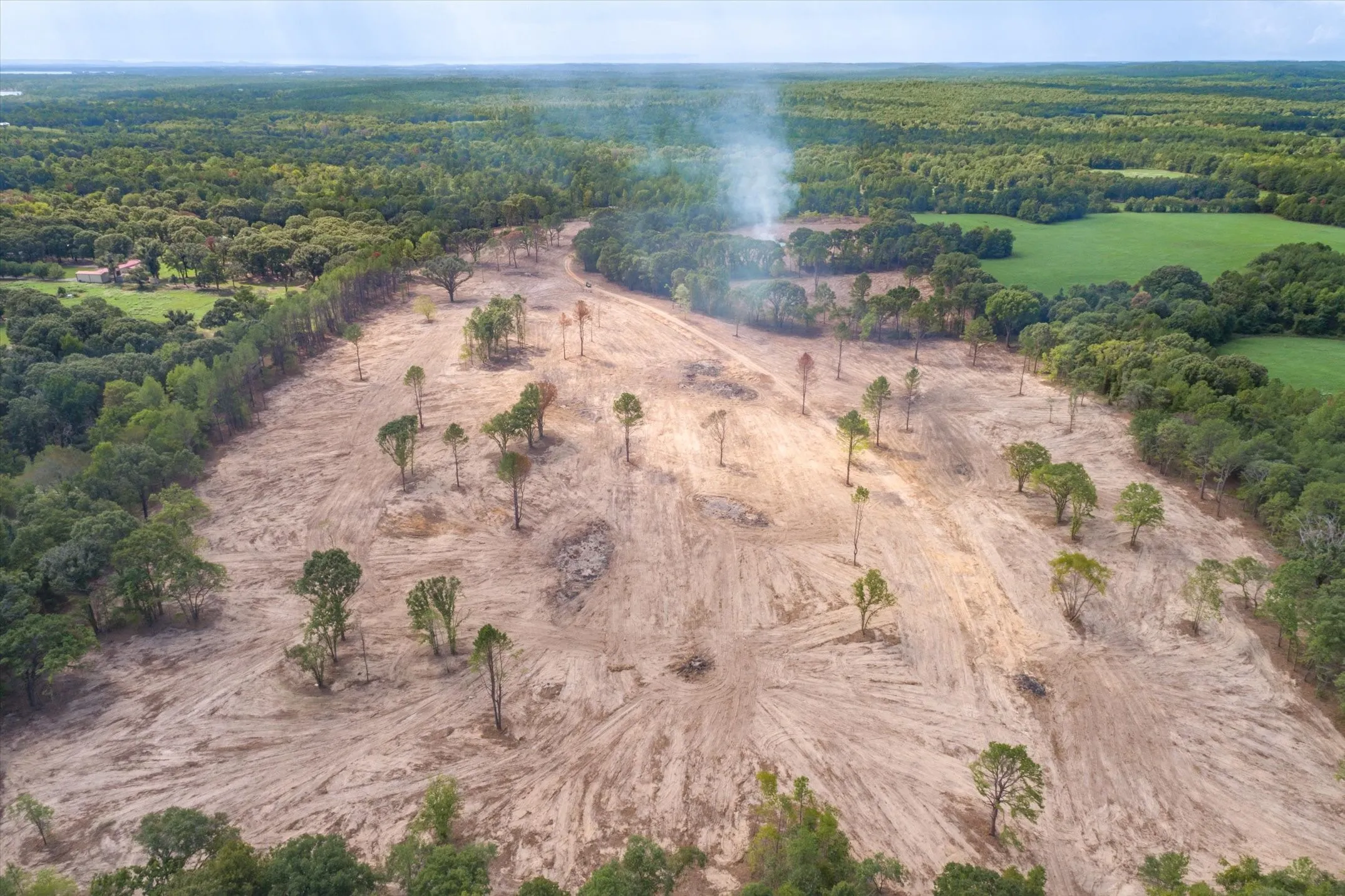 Expansive cleared land parcel offering significant development potential