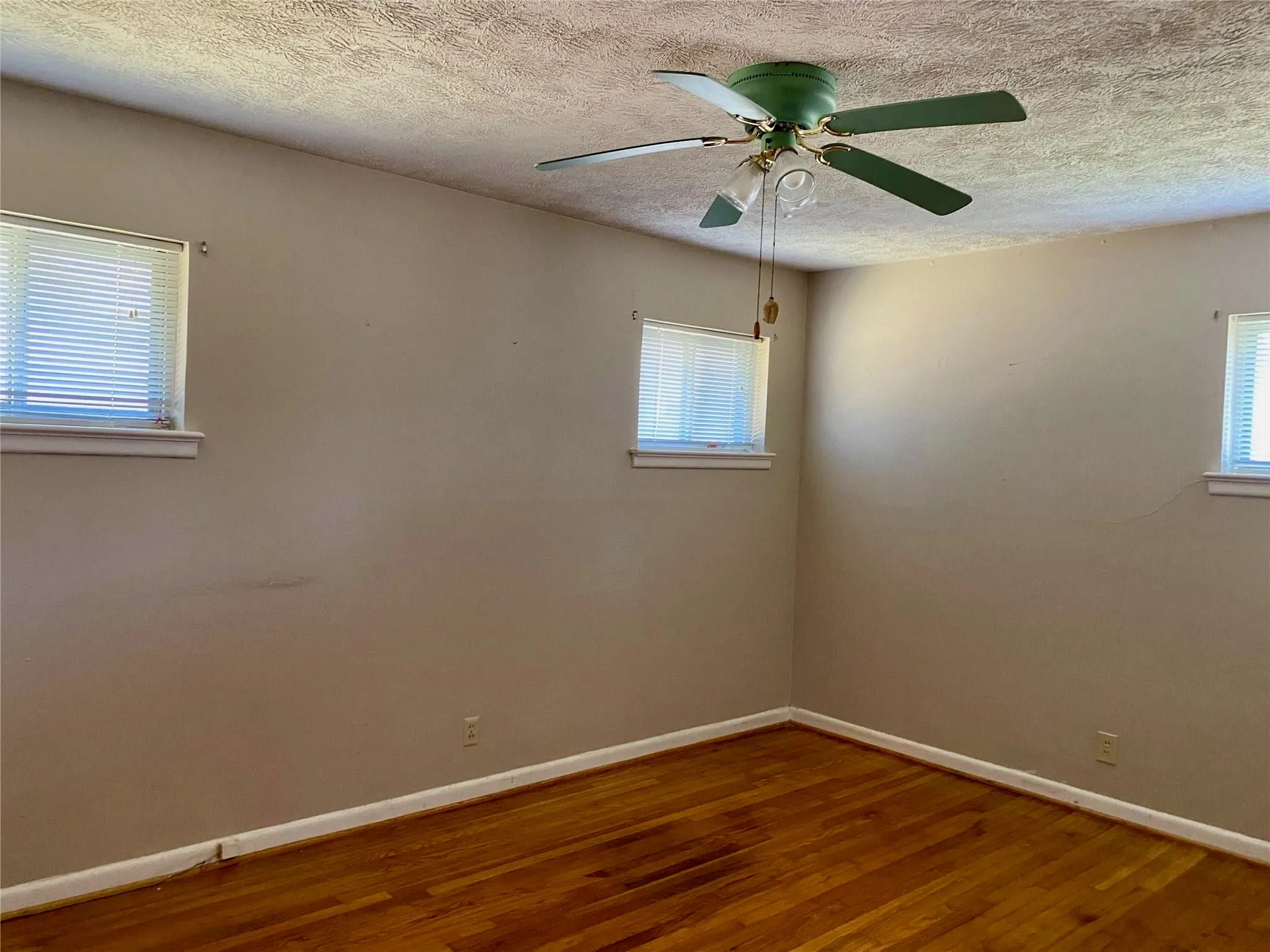 Guest Bedroom 14'.9" X 10'.6" with a closet.