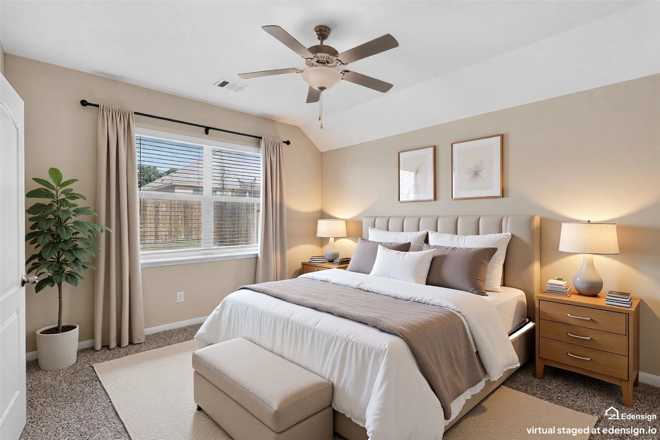 Carpeted bedroom featuring a large window with blinds, a ceiling fan with light fixture, and a tray ceiling
