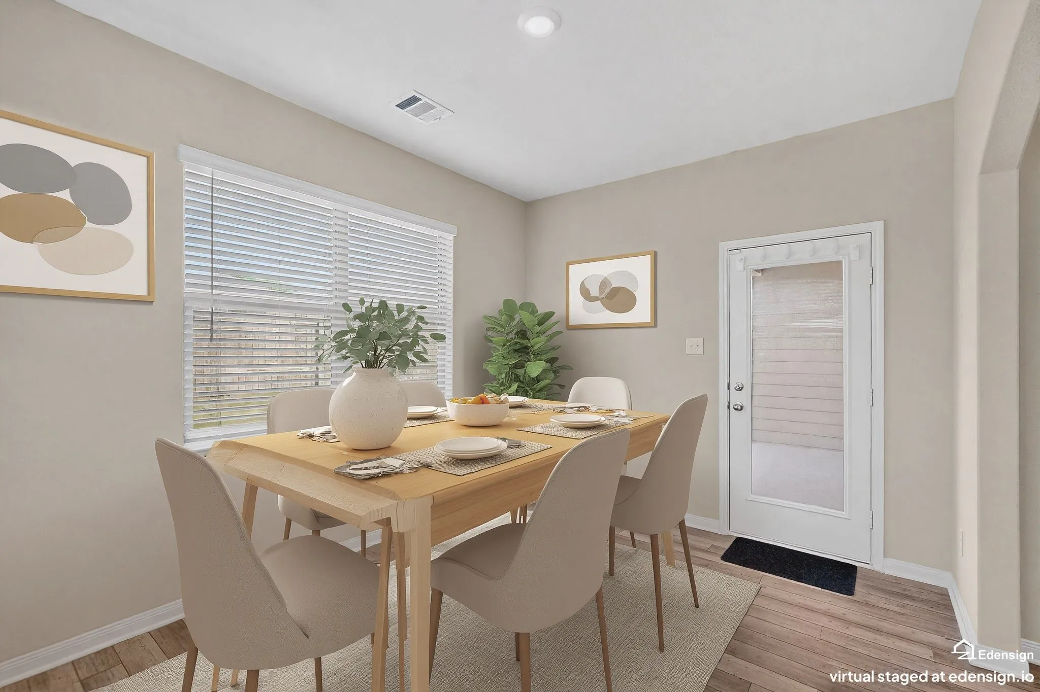 Dining area featuring wood-finish flooring and neutral wall tones