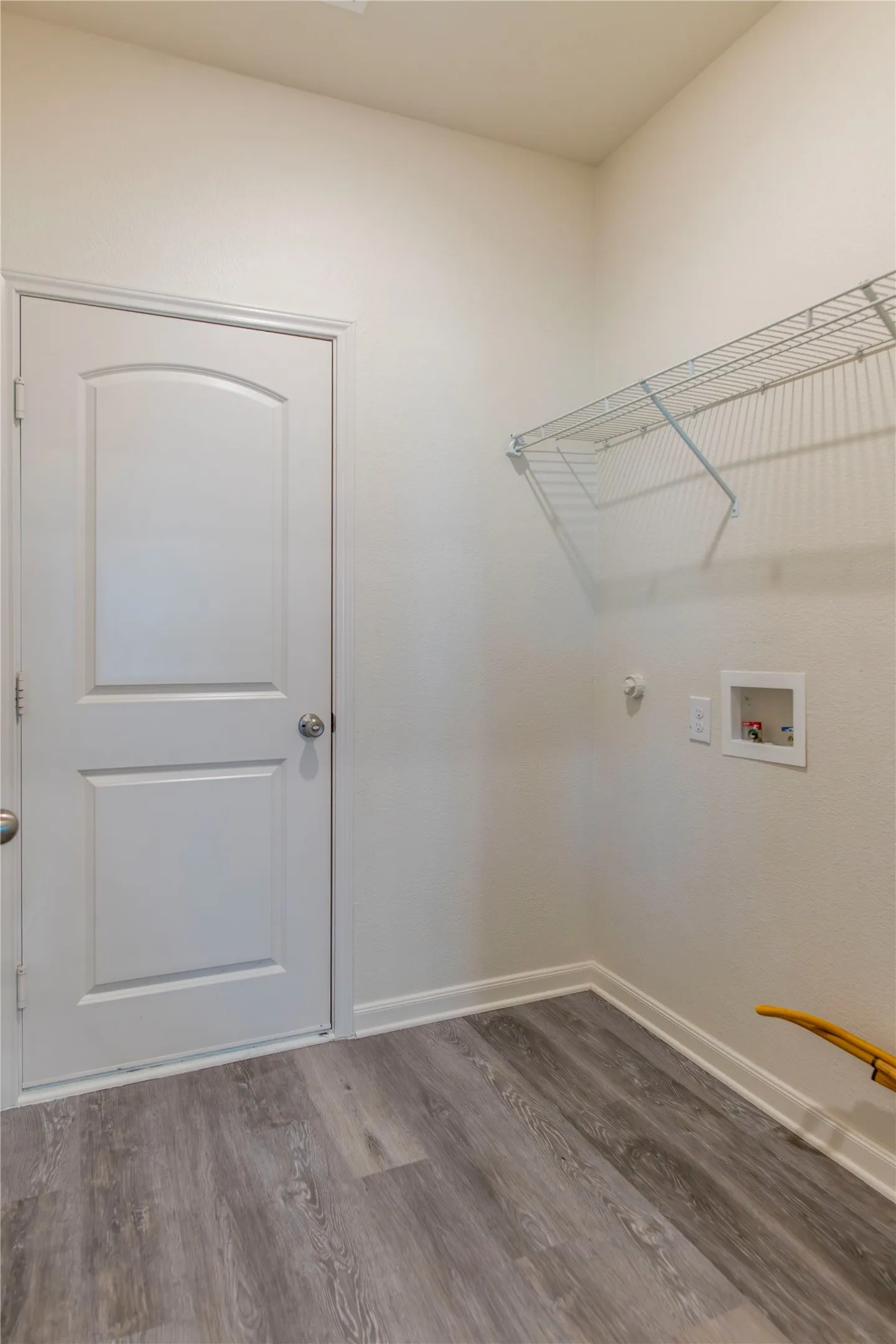 Laundry/Mud Room room at end of Kitchen, door to garage at far endgarage