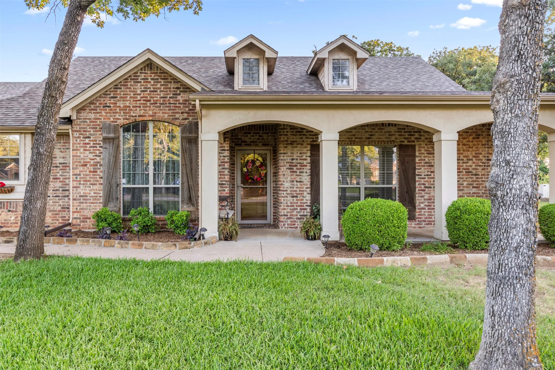 Large front porch with swing to sit, drink coffee and waive to the neighbors.