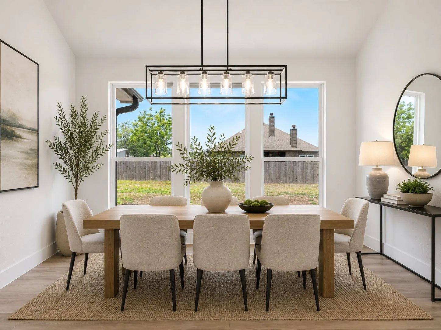Dining area featuring bright natural light from large windows