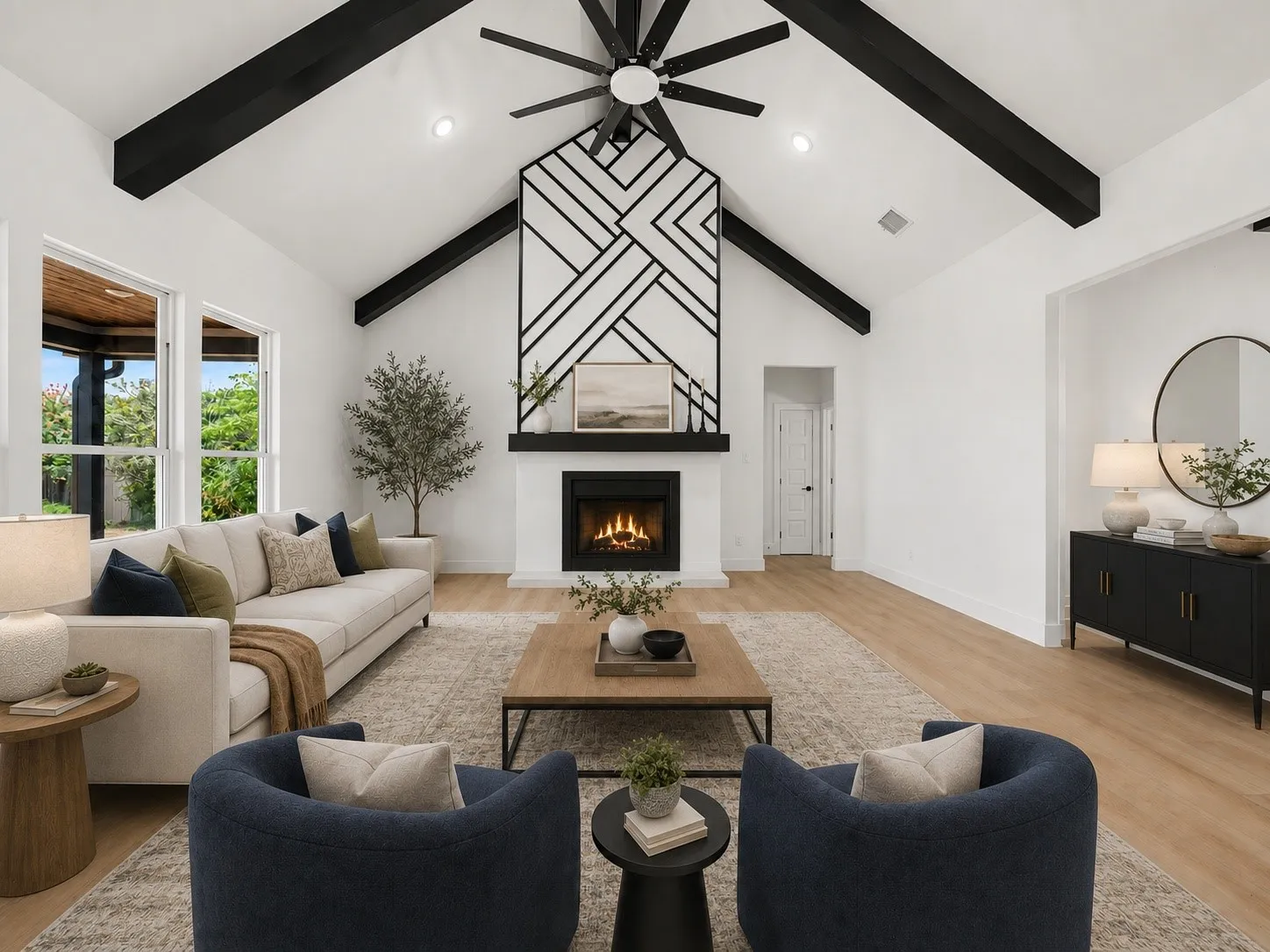 Vaulted ceiling with exposed black beams, central fireplace feature with a geometric accent wall, recessed lighting, and wood-finish flooring