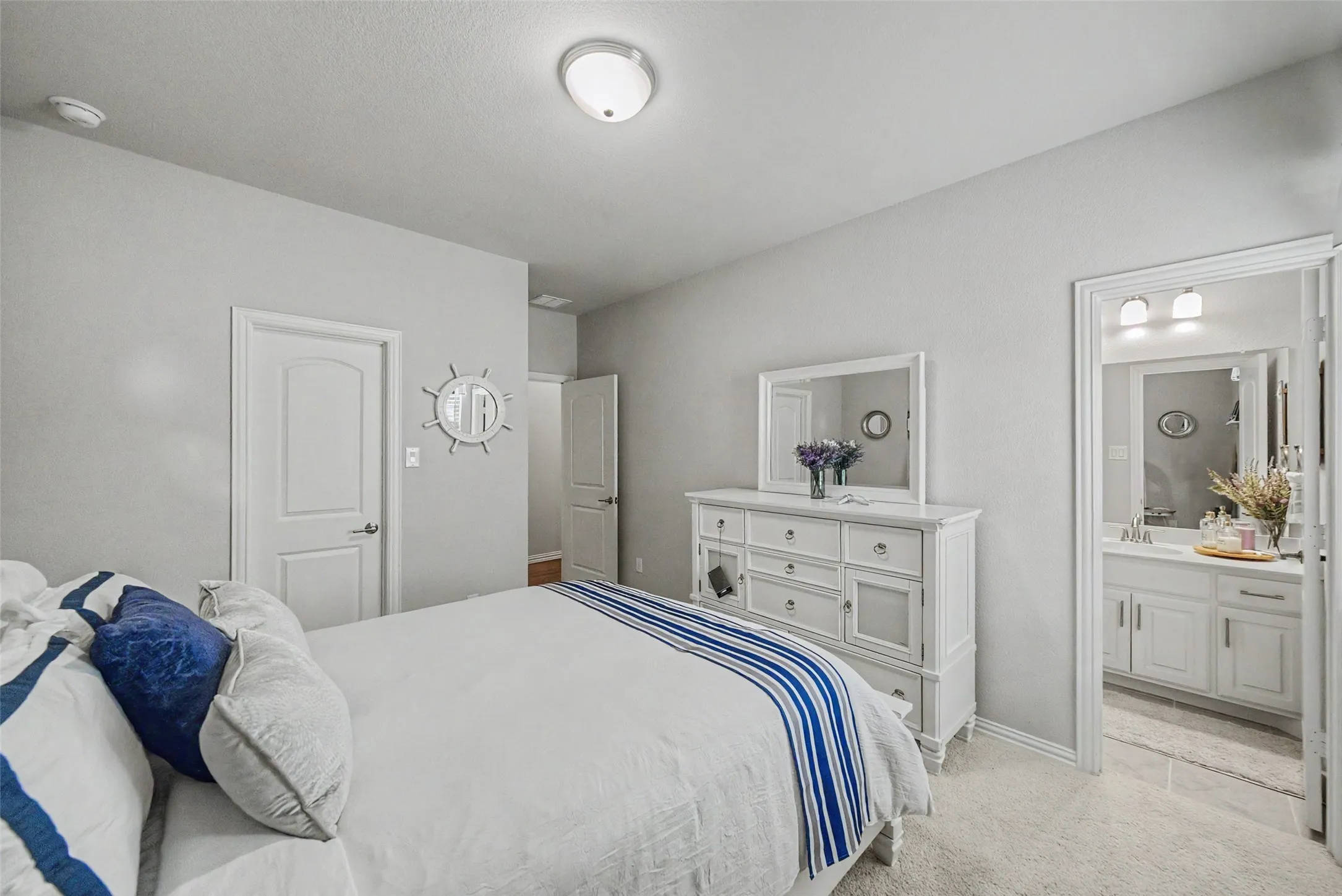 Bright and open bedroom with private bath