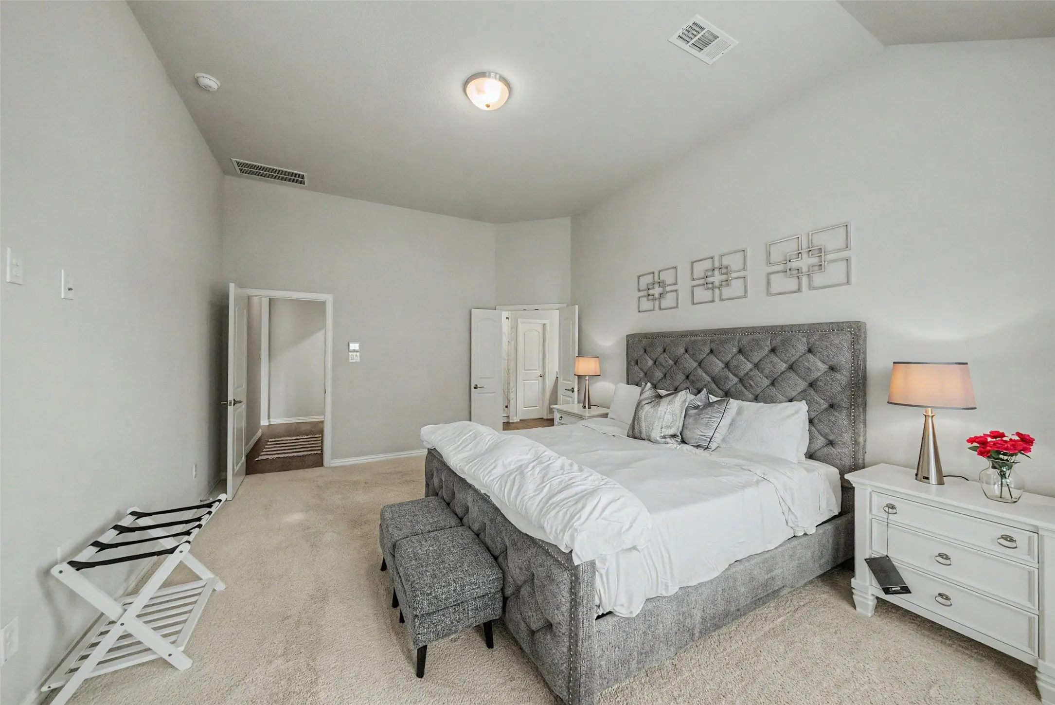Open and bright primary bedroom