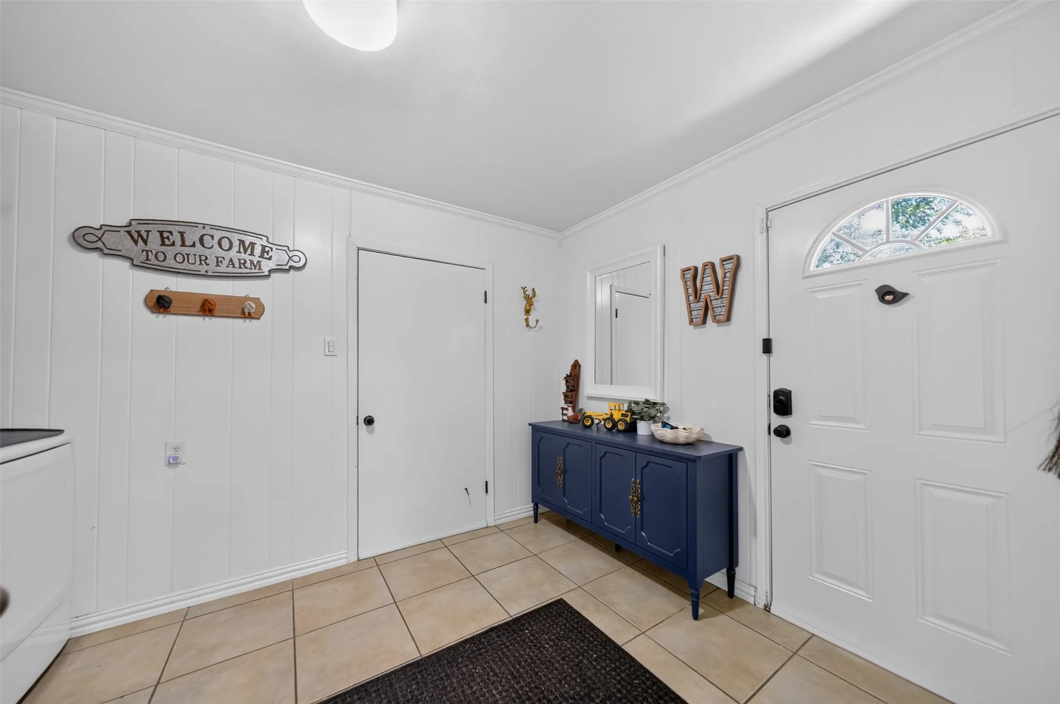 White paneled walls with a contrasting white ceiling