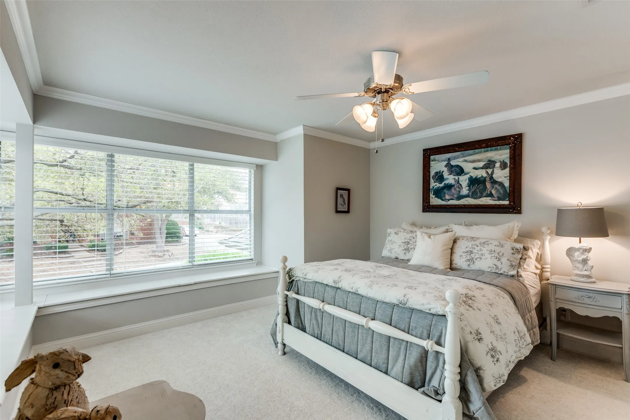 Bedroom with walls of windows and window seats