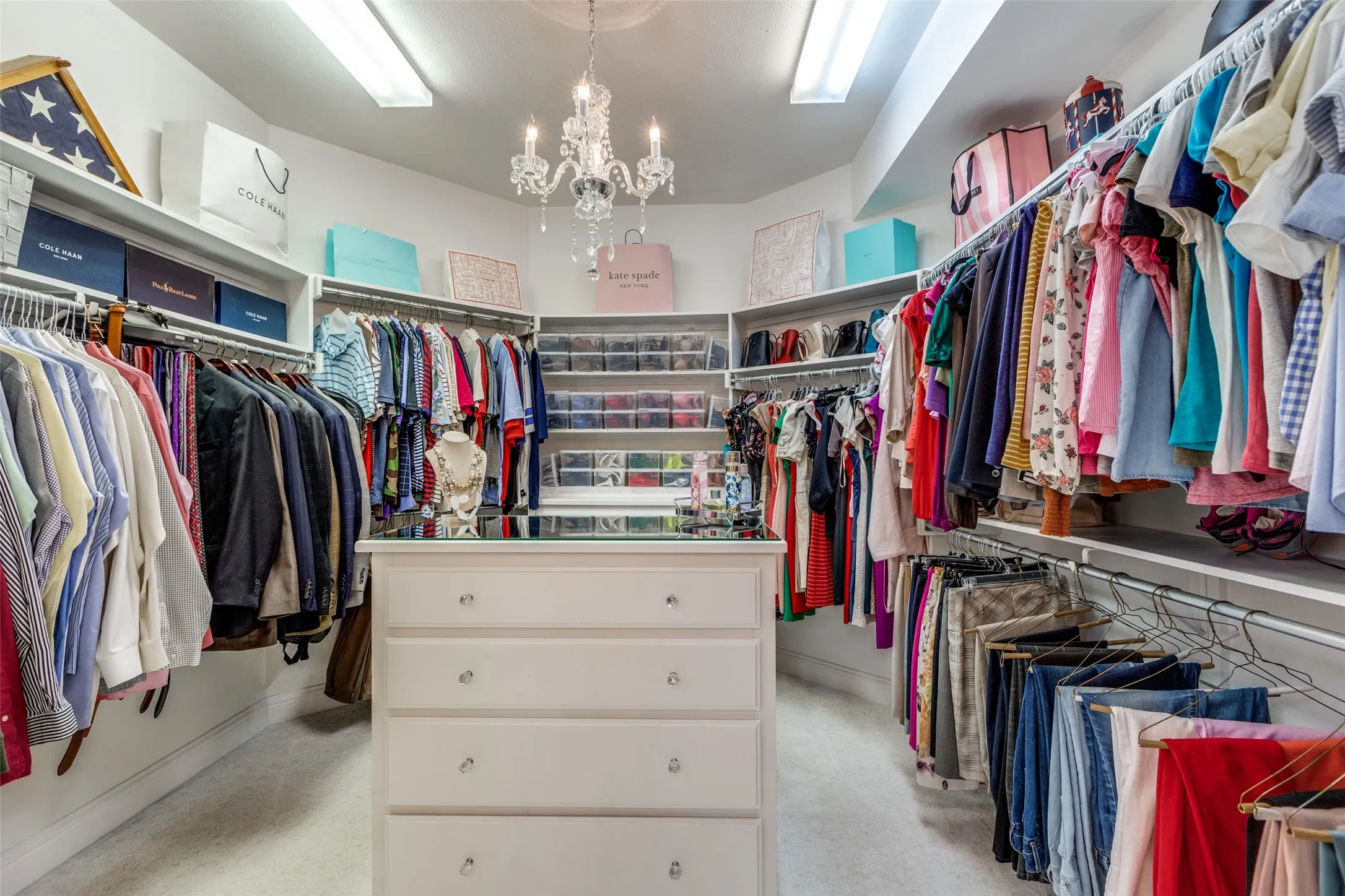 Primary closet with two built in dressers