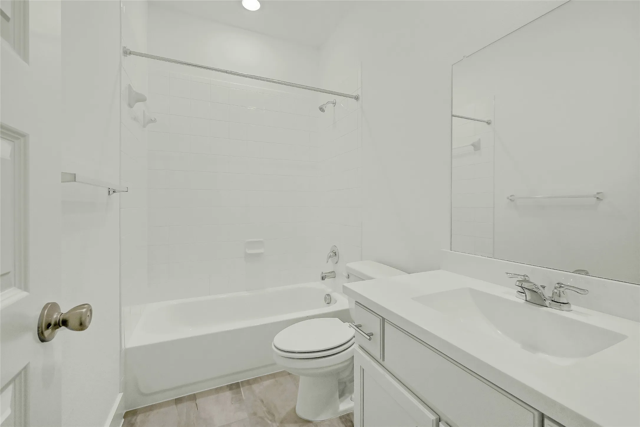 Bathroom with toilet, recessed lighting, bathing tub / shower combination, and vanity
