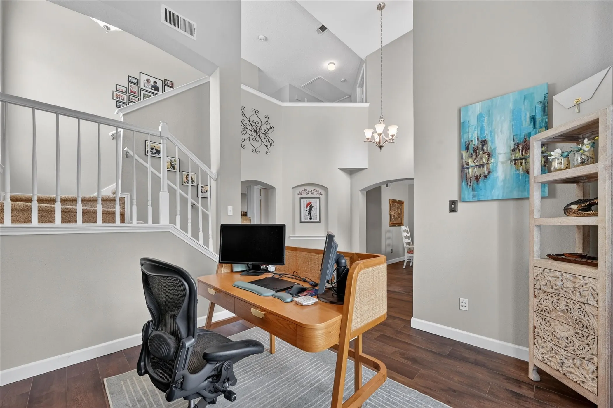 Living room off of entry used as a home office