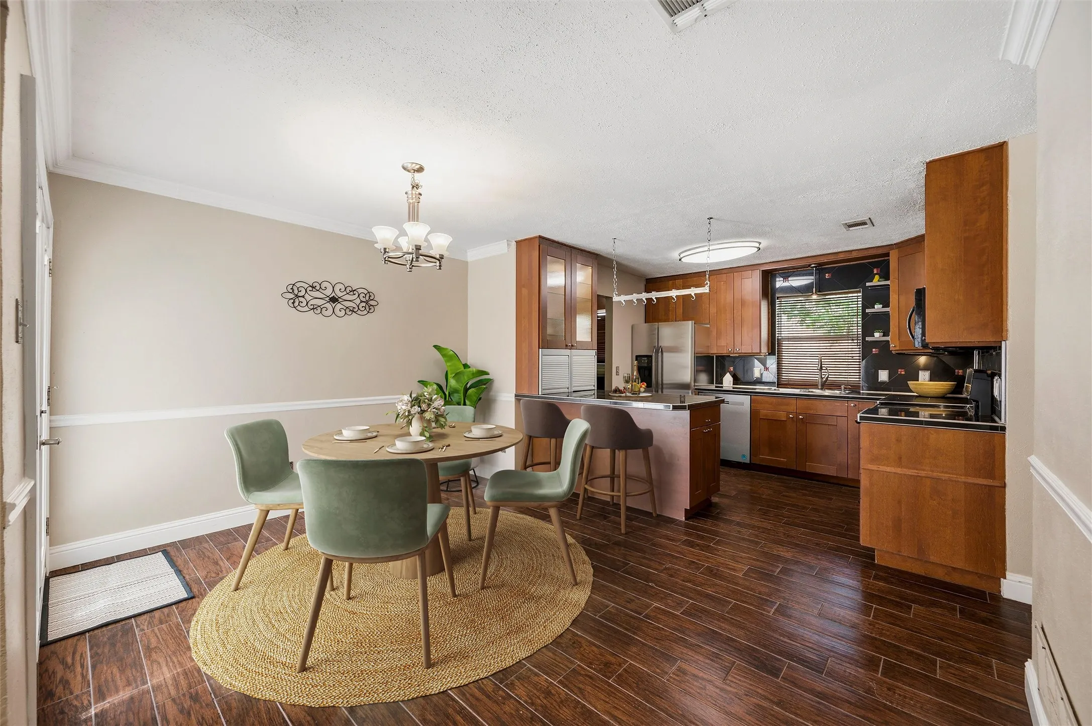 Dining room opens to the kitchen.