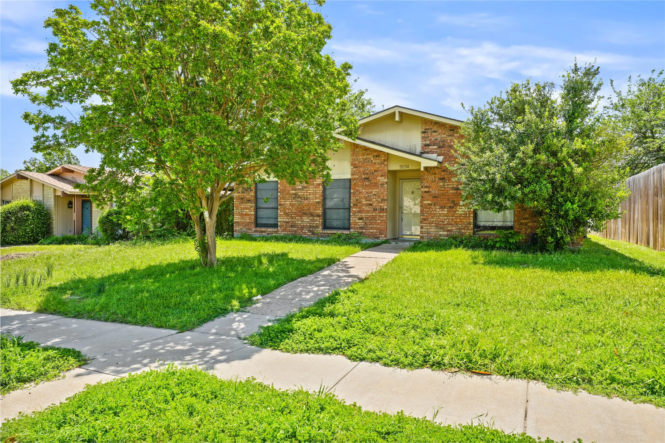 View of front of property with a front yard