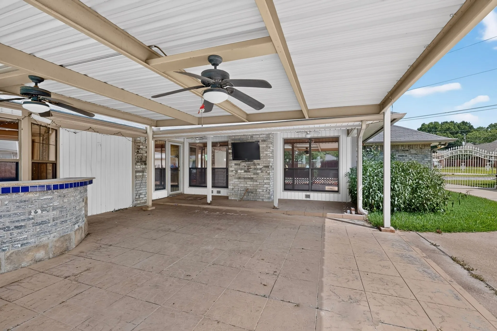 Covered patio with stamped concrete flooring