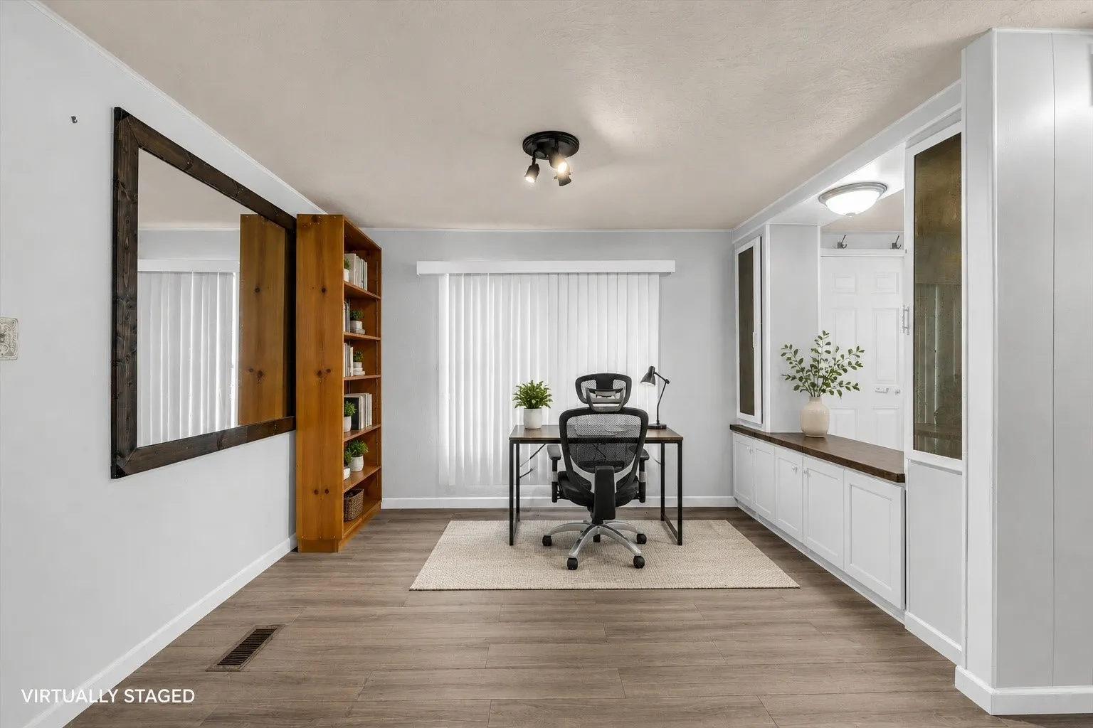 Family room used as a converted office space