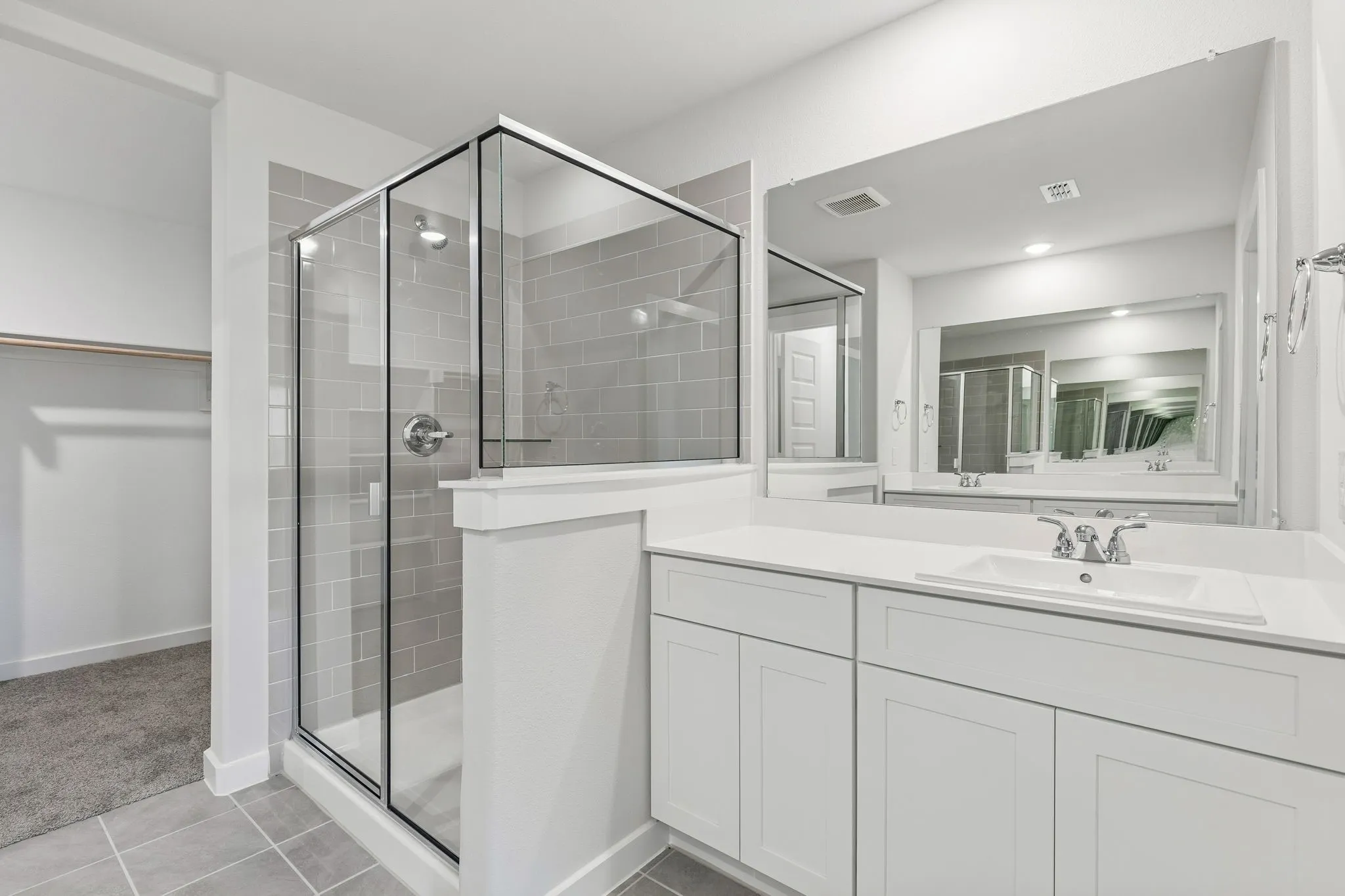 Primary Bathroom in the Harrison home plan by Trophy Signature Homes – REPRESENTATIVE PHOTO