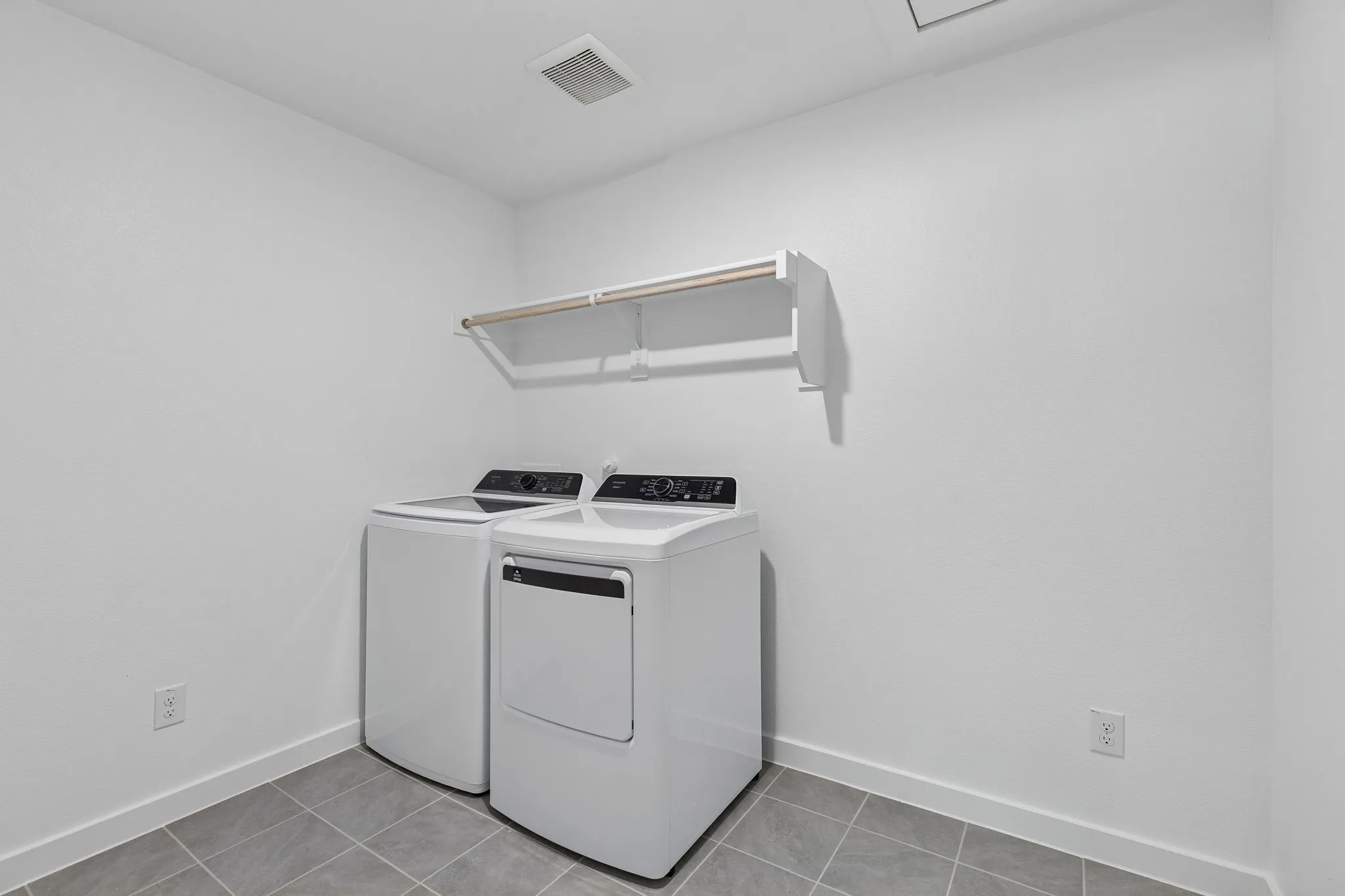 Utility Room in the Harrison home plan by Trophy Signature Homes – REPRESENTATIVE PHOTO