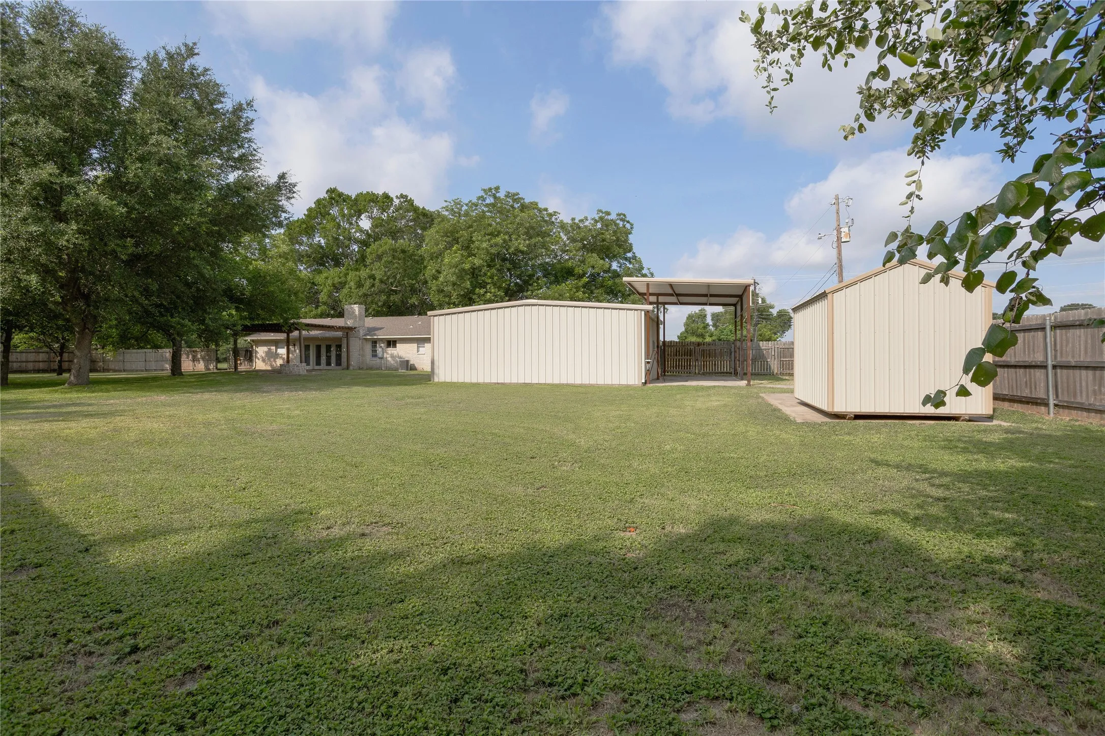Huge backyard, with mature trees.