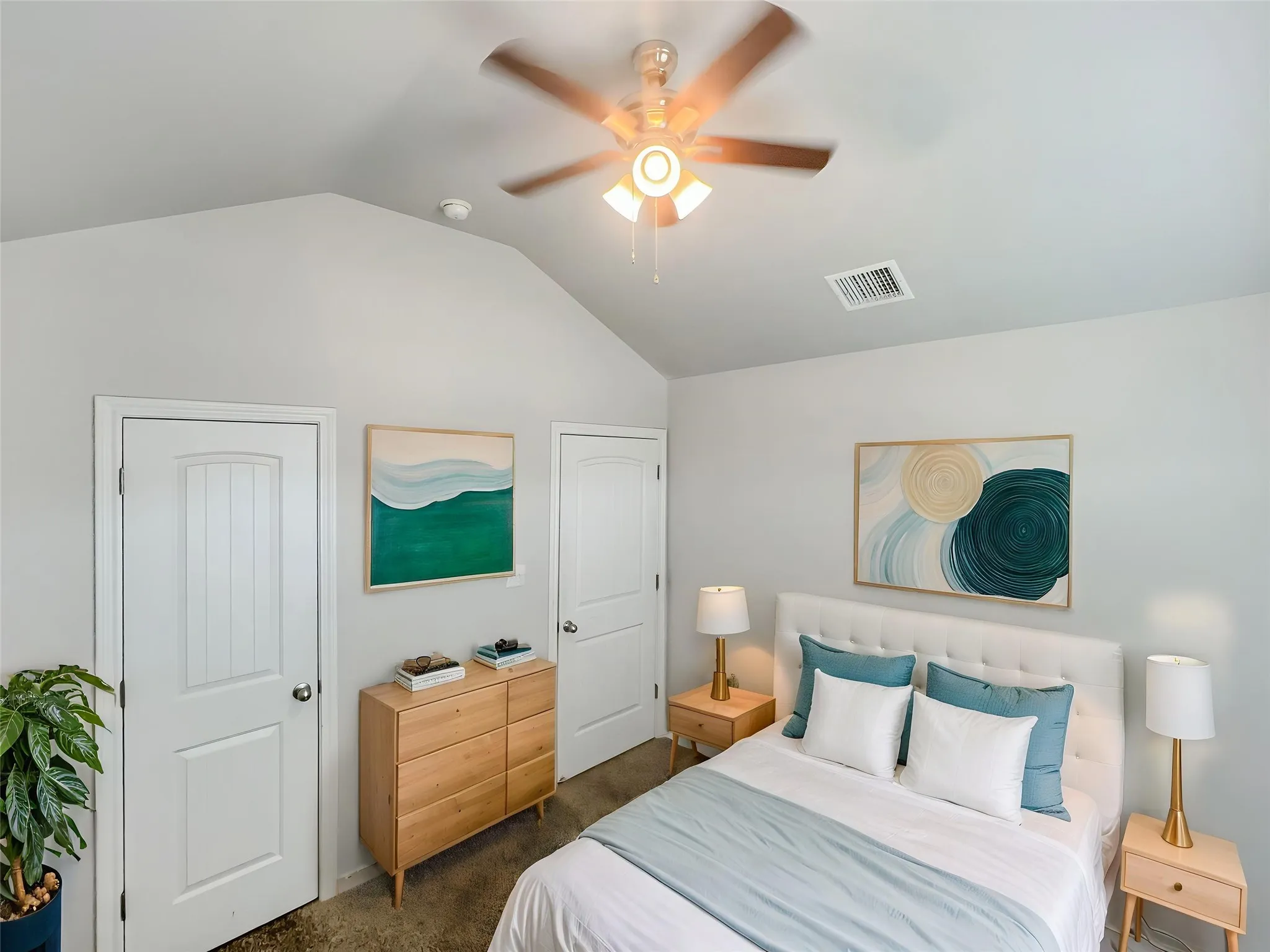 Virtually staged
Vaulted ceiling with a ceiling fan