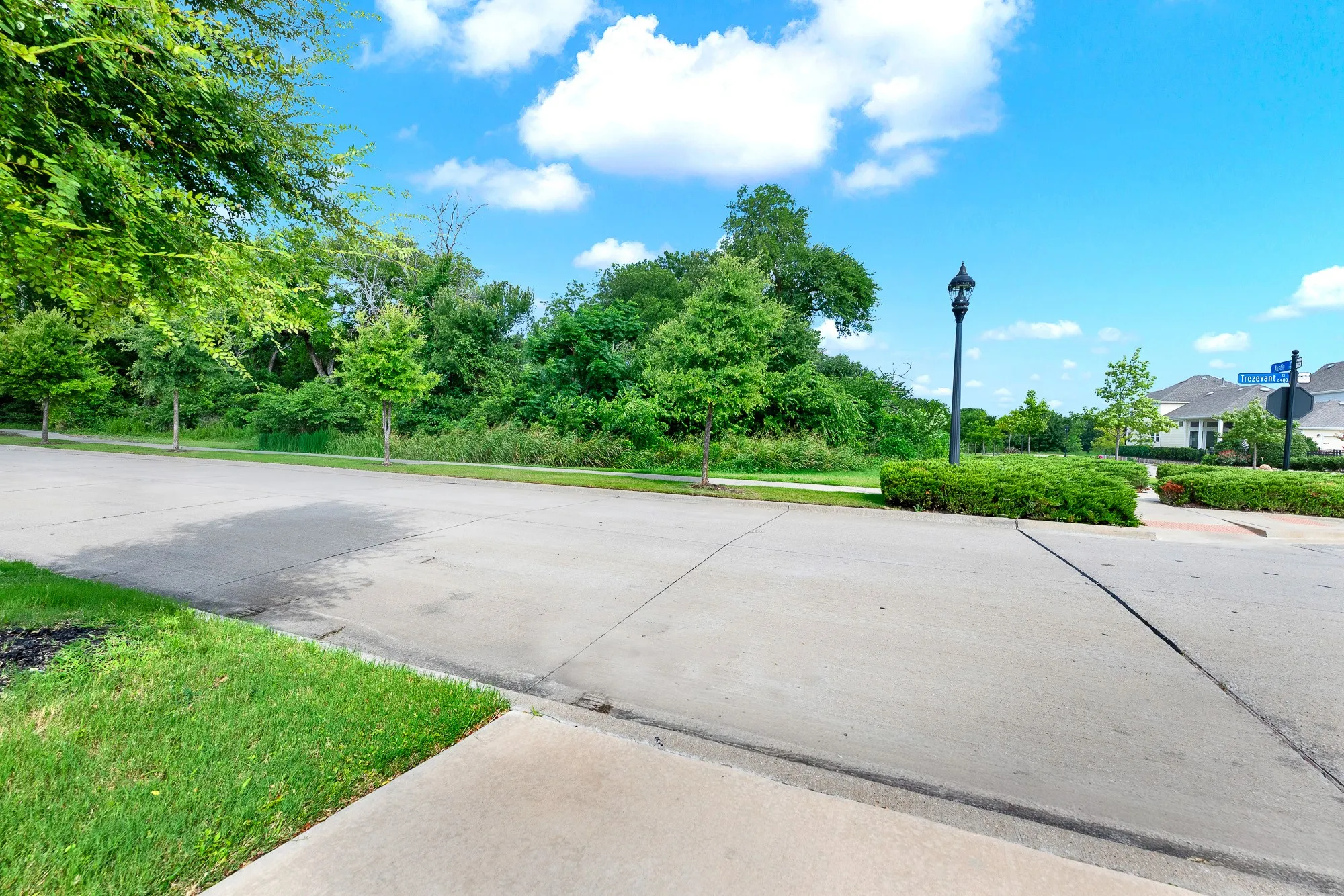 Protected greenspace directly across from property, walking trail access