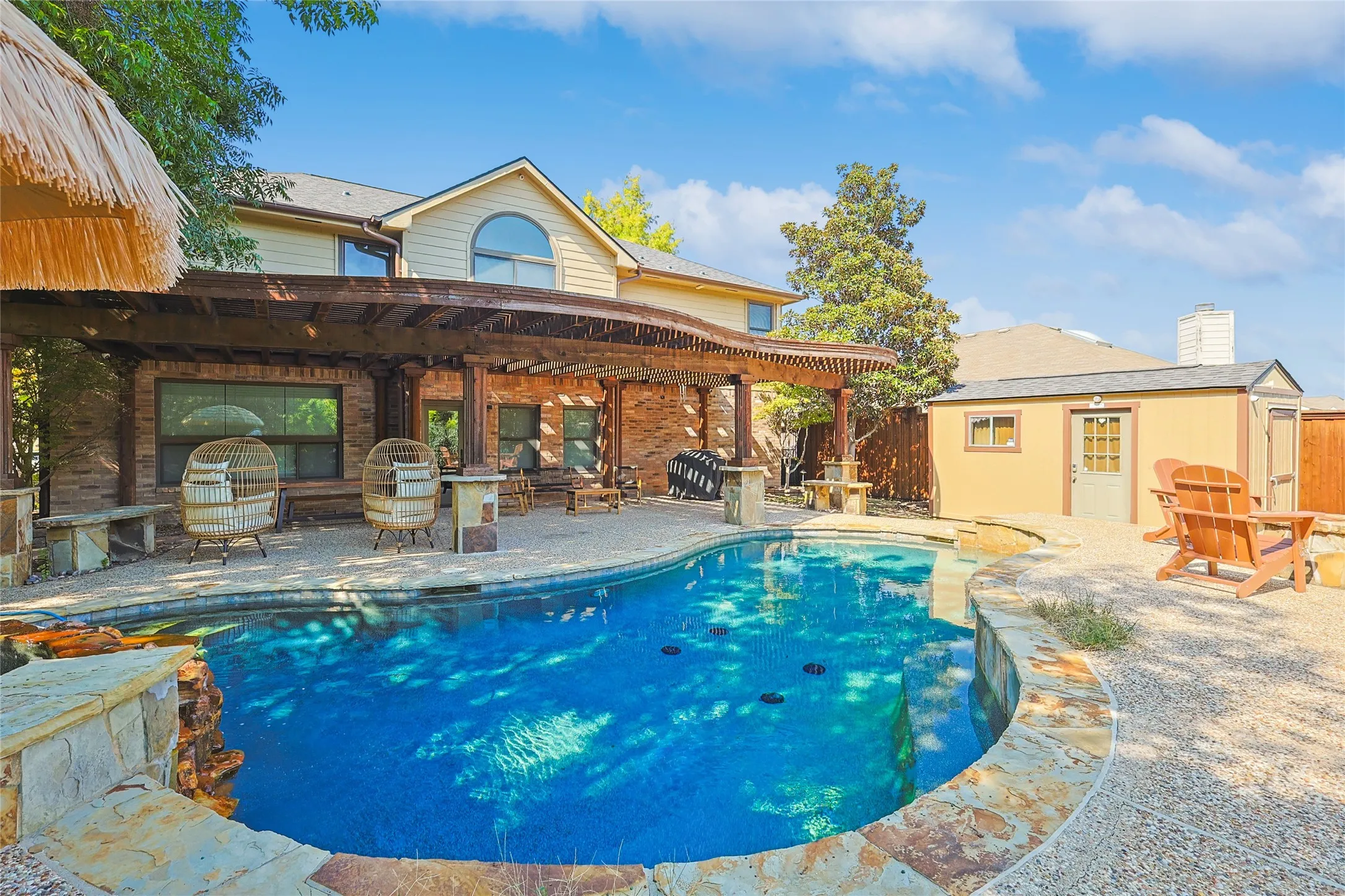 Outdoor pool with a patio
