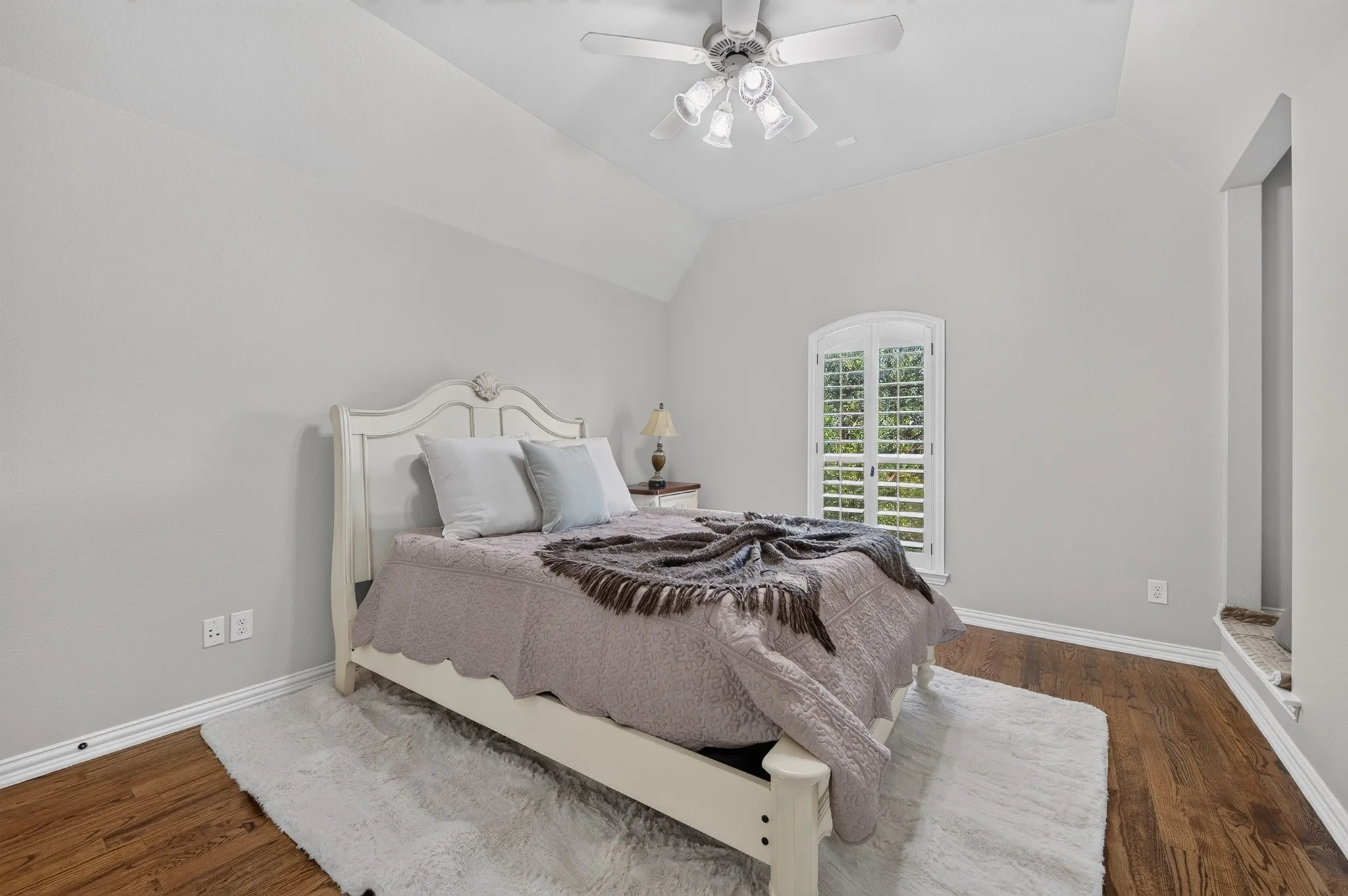 One of 3 large secondary bedrooms located upstairs.   This one offers a super cute alcove space that is great for a reading nook or extra storage space
