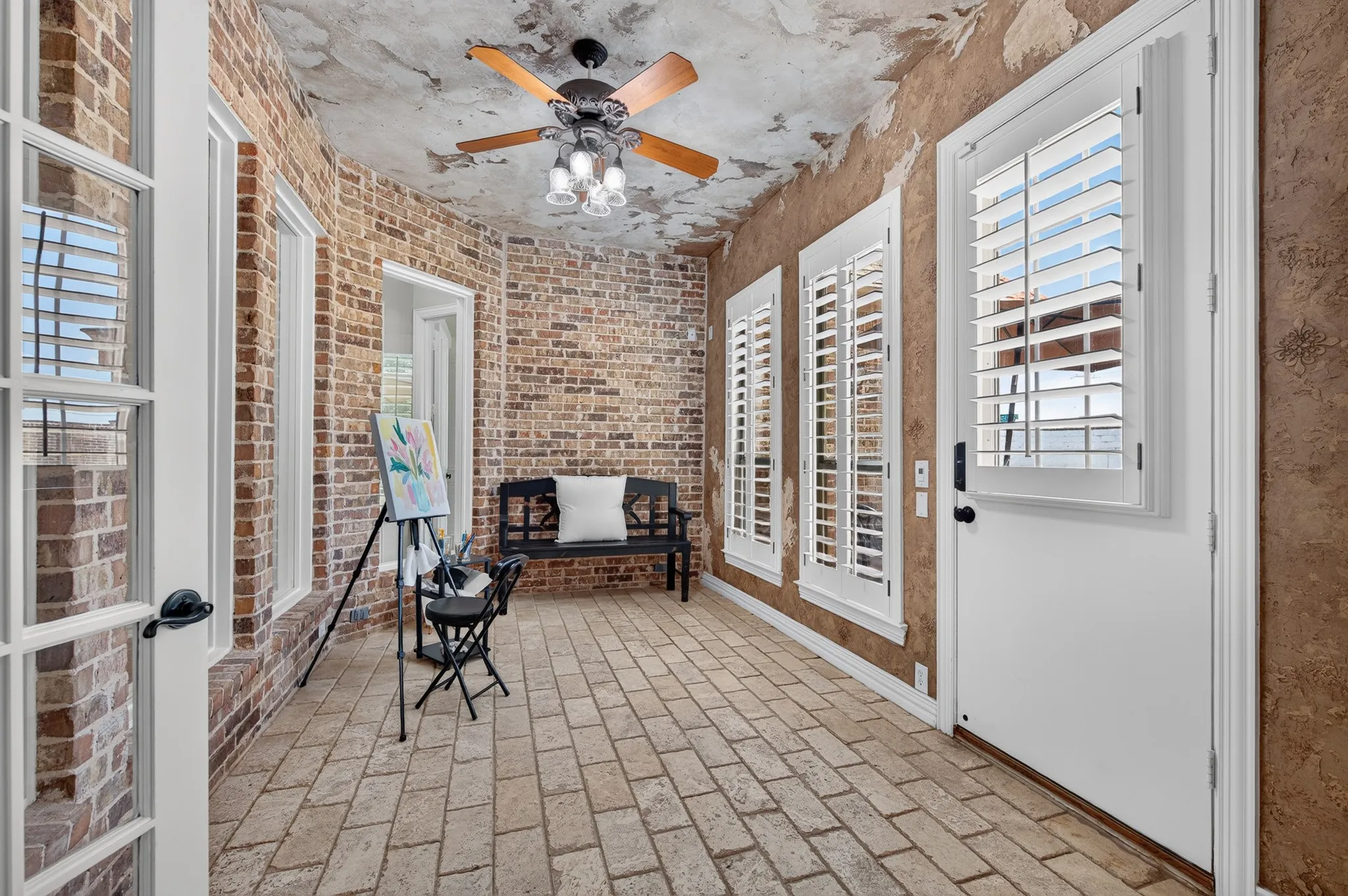 Check out this unique, fully enclosed sun room located off the family room and breakfast room space.  Unique brick flooring, plantation shutters and beautiful enclosed glass windows.  The possibilities for this room are endless! What a great art studio, reading nook, prayer room or whatever fits your needs!