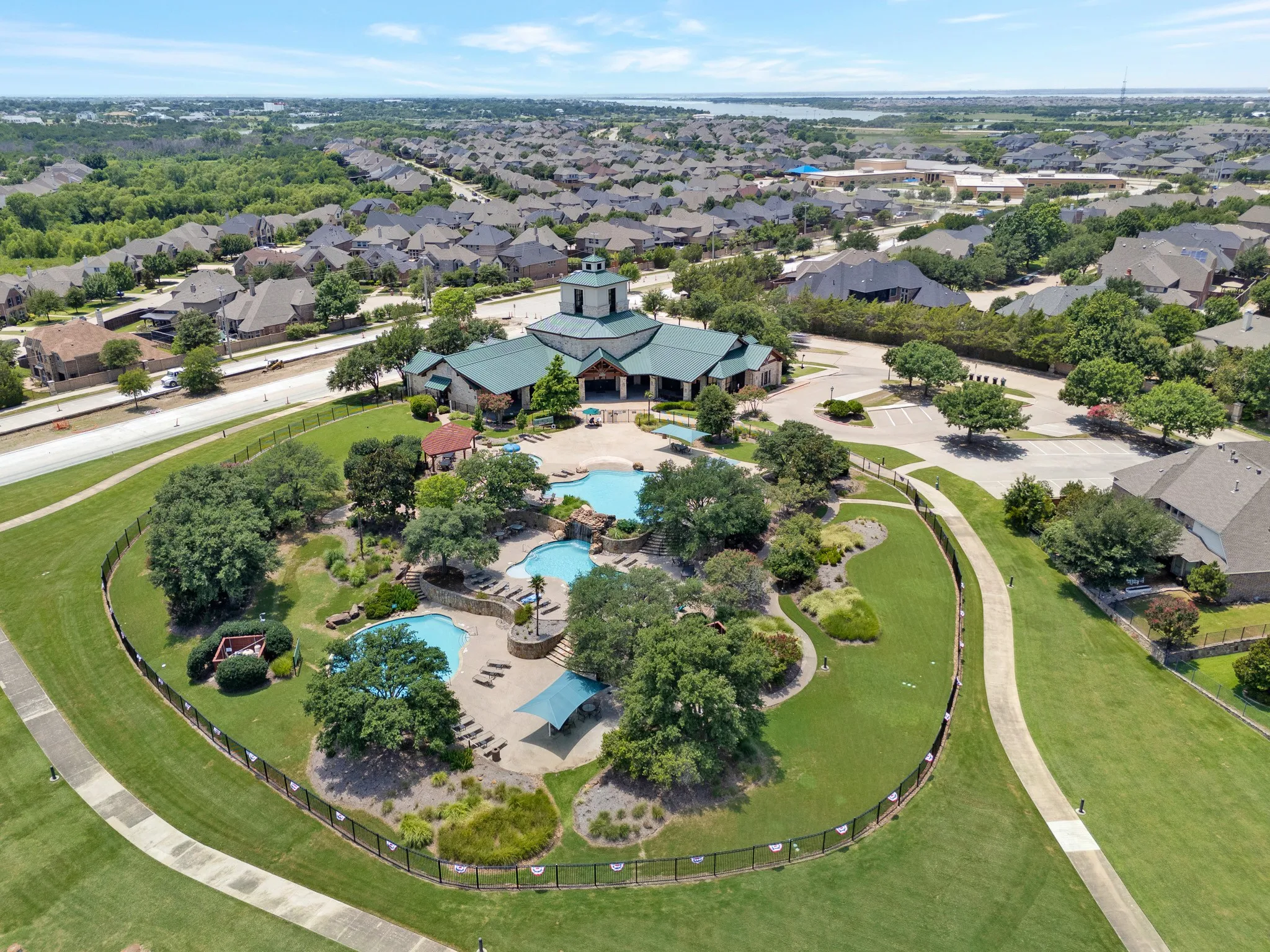 The neighborhood Clubhouse, with 3 different pools and hike and bike trails with stocked pond all for residents use