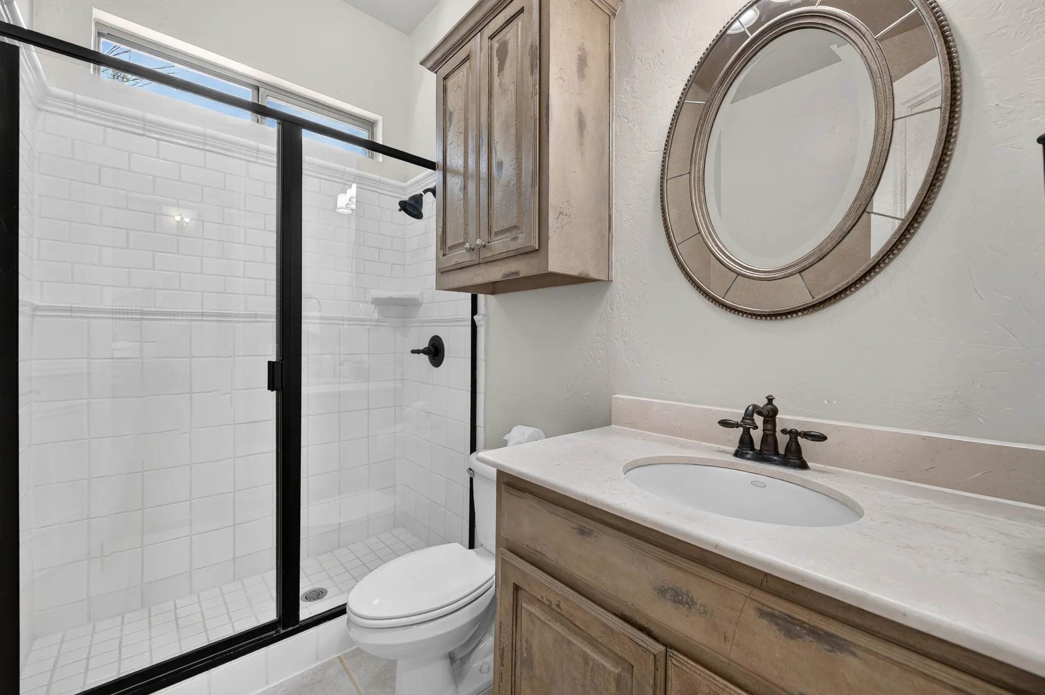 Full bath located downstairs with secondary bedroom .   Large size bathroom with space for extra storage