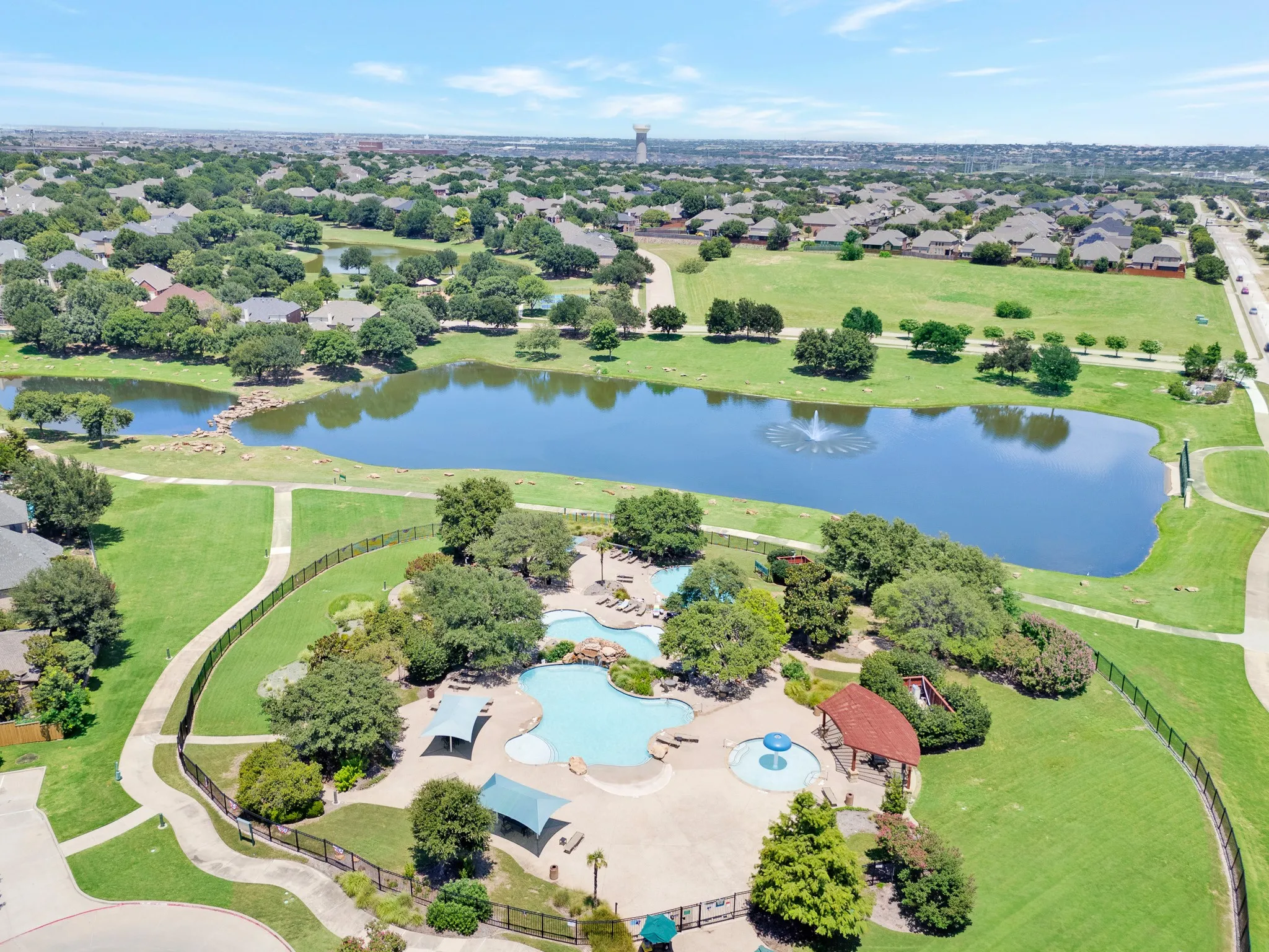 Aerial view of the neighborhood pool space with 3 different pools!