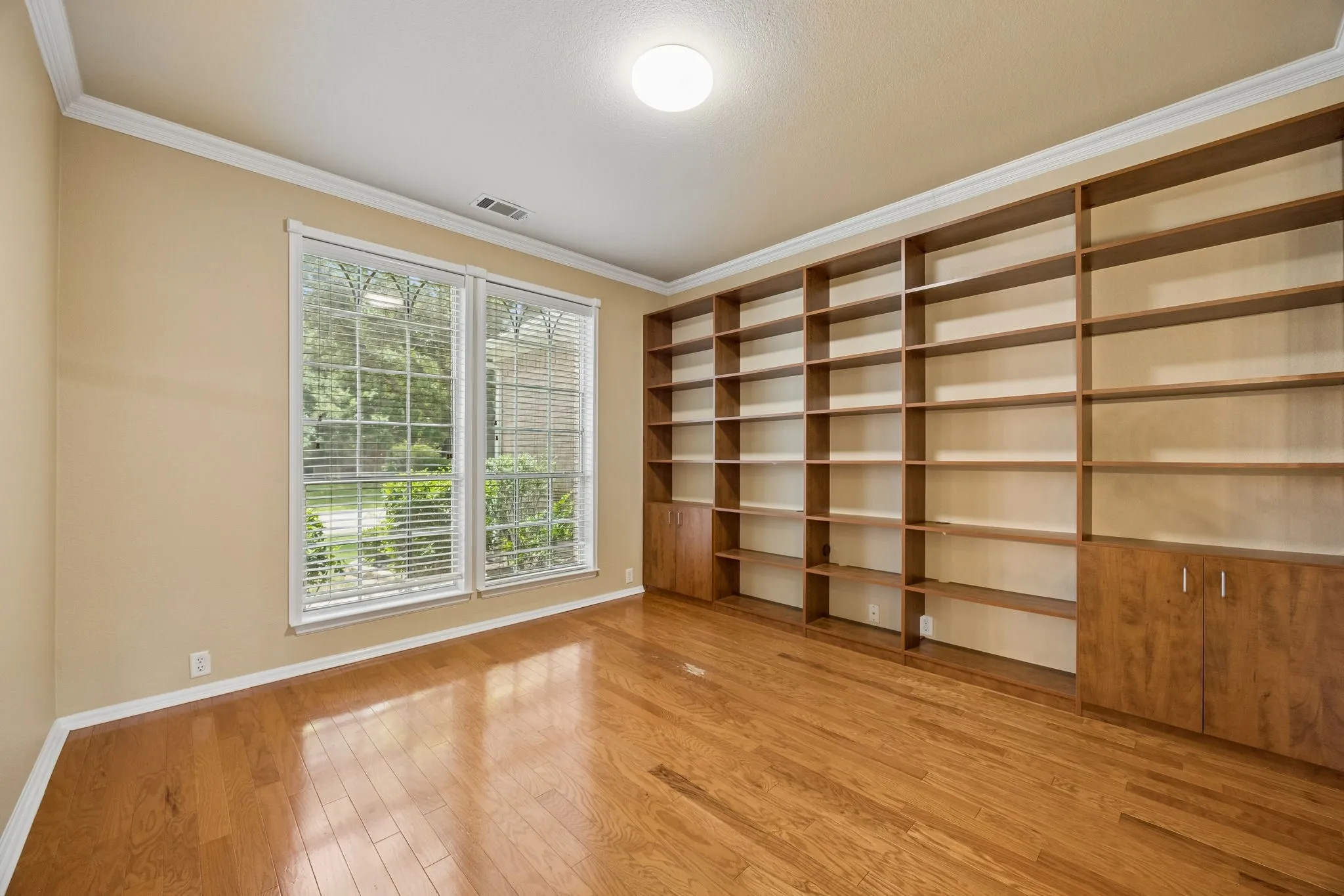 Large office with built in shelves