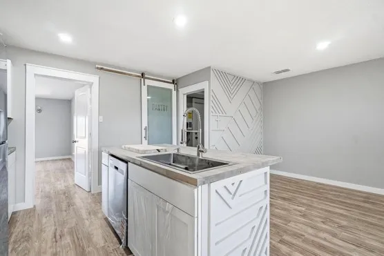 Island with dishwasher and kitchen sink