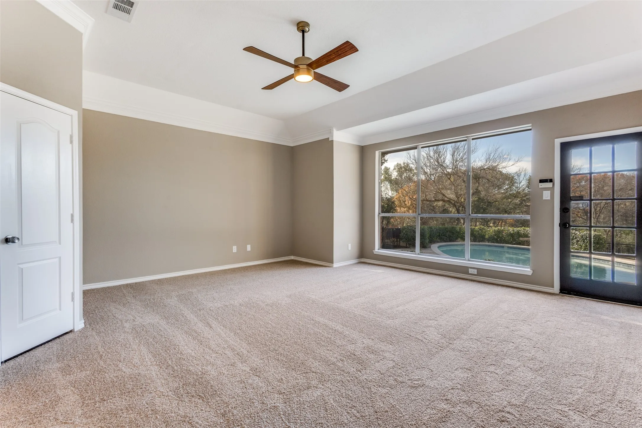 Large Primary bedroom with private access to the pool.