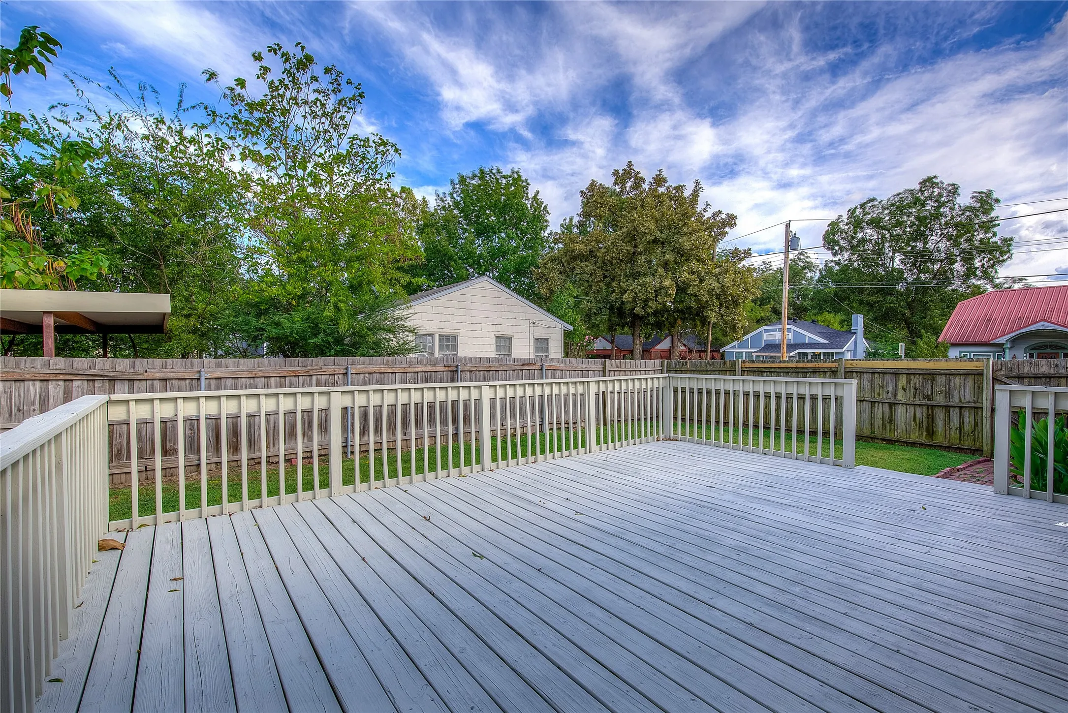 Additional view of deck and back yard