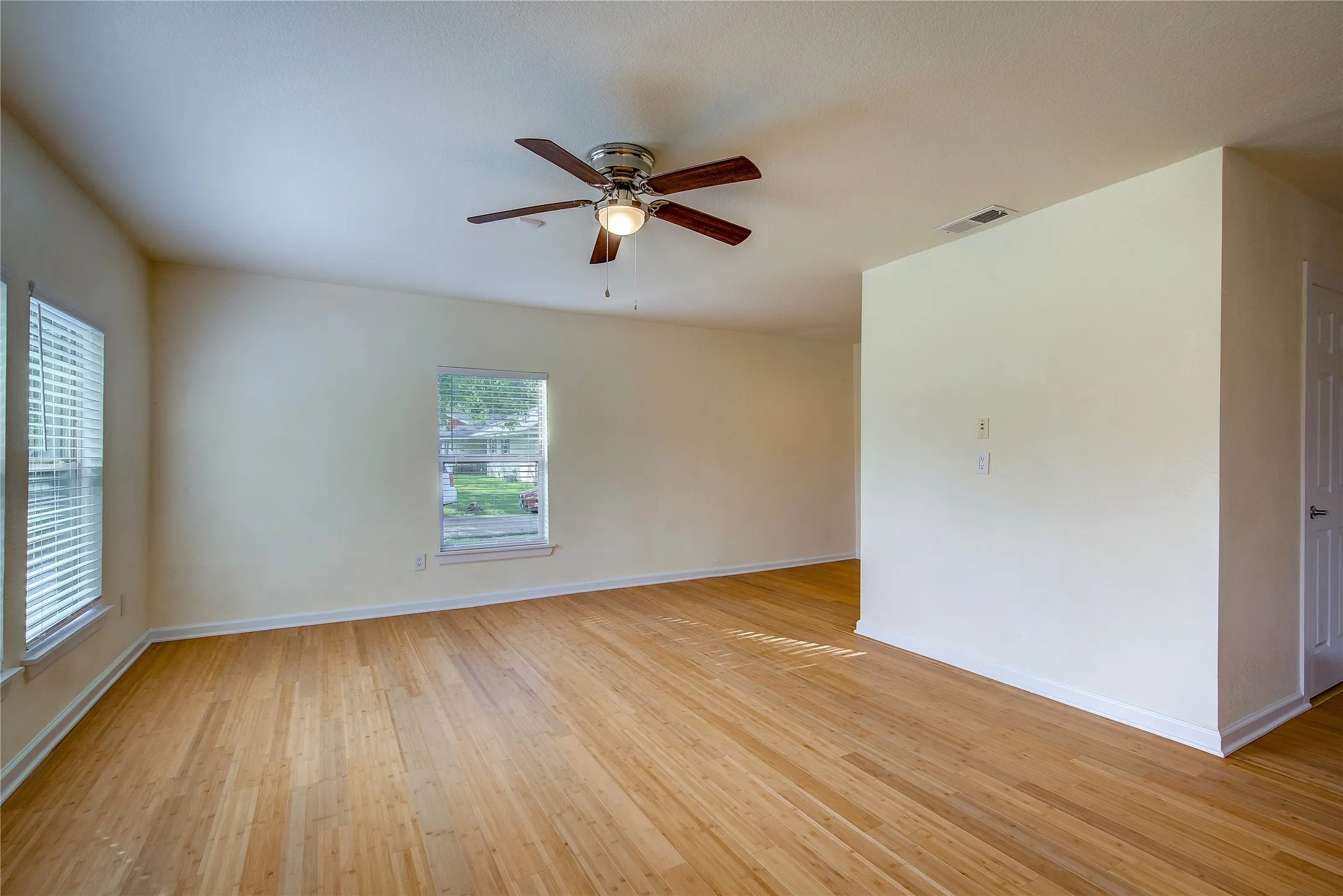 Living room with nook area in view