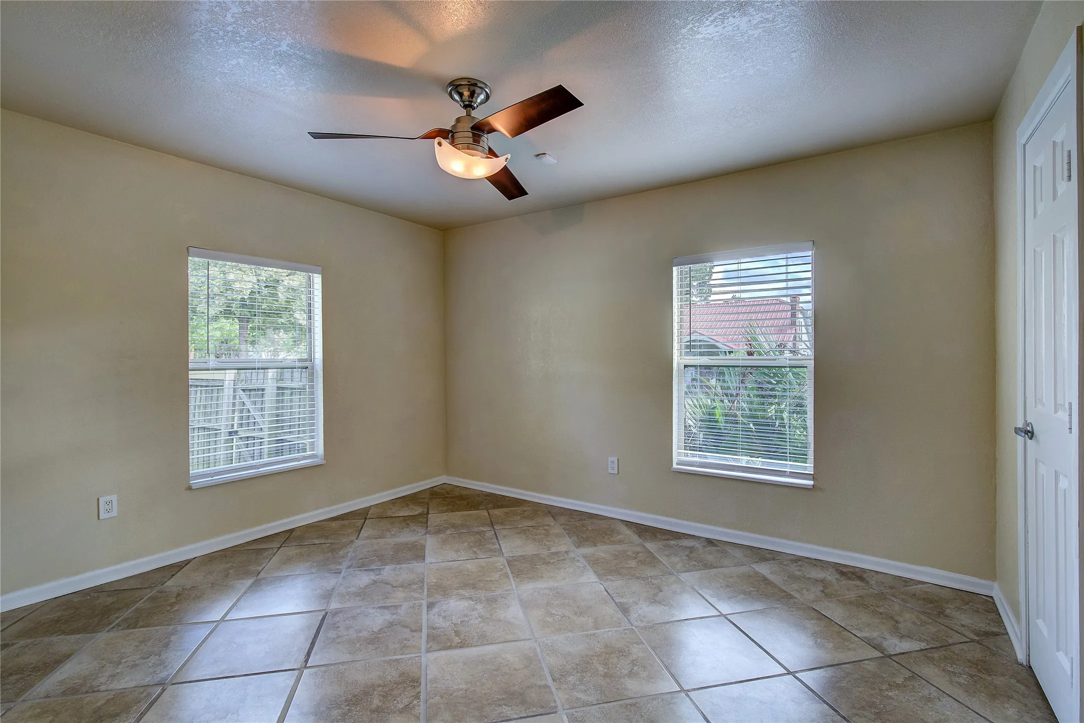 Secondary bedroom with c-tile flooring