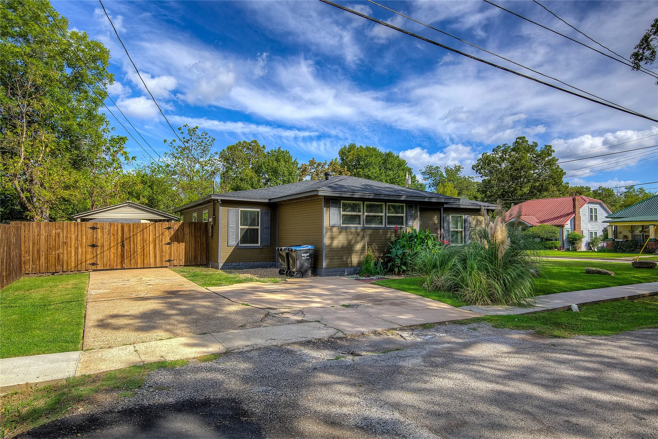 Gated access to carport and rear of home
