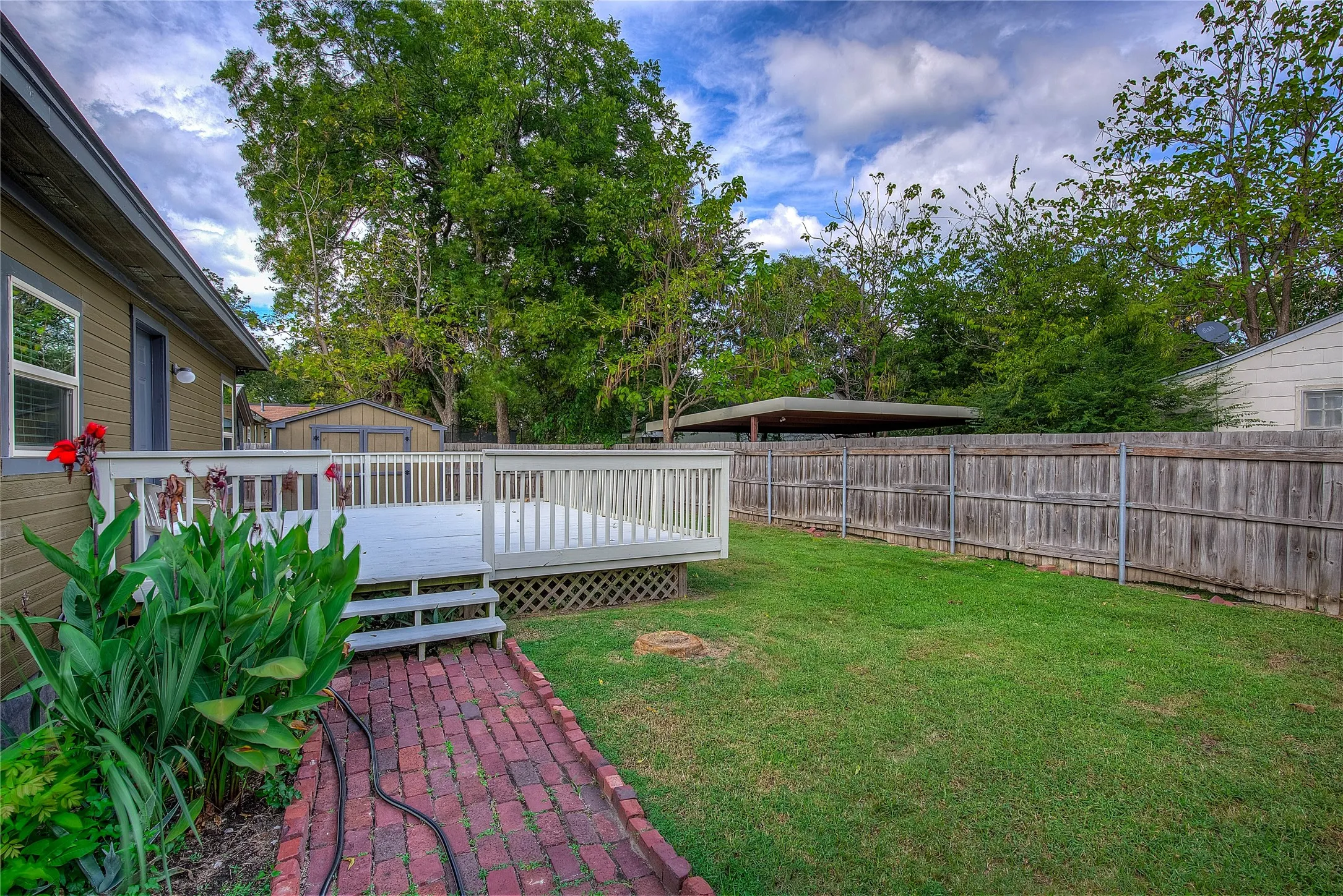 Enjoy the bricked walkways and peaceful back yard haven