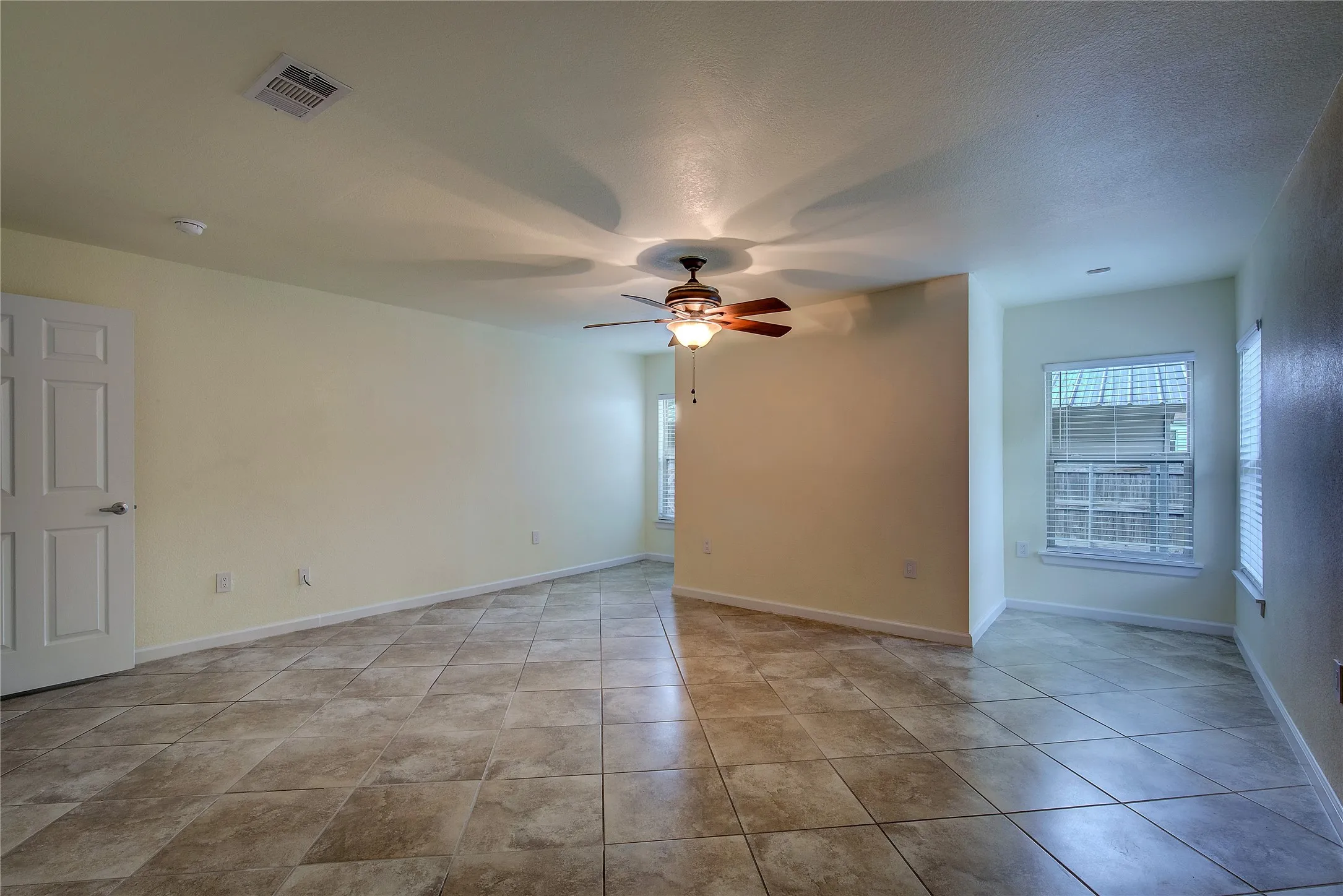 C-tile flooring for easy maintenance and a large walk-in closet.