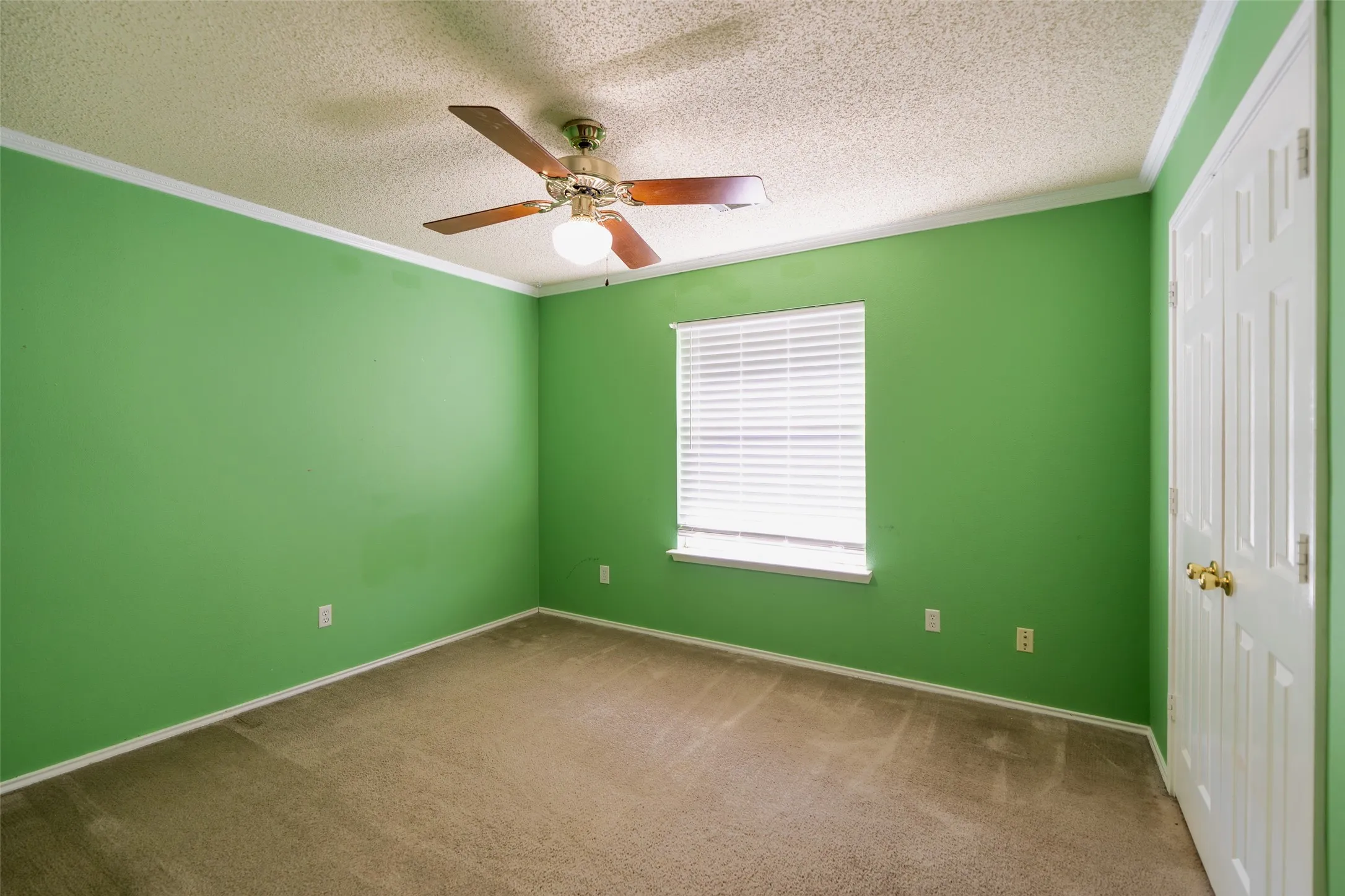 Large secondary bedroom offering flexibility for family, guests or a home office