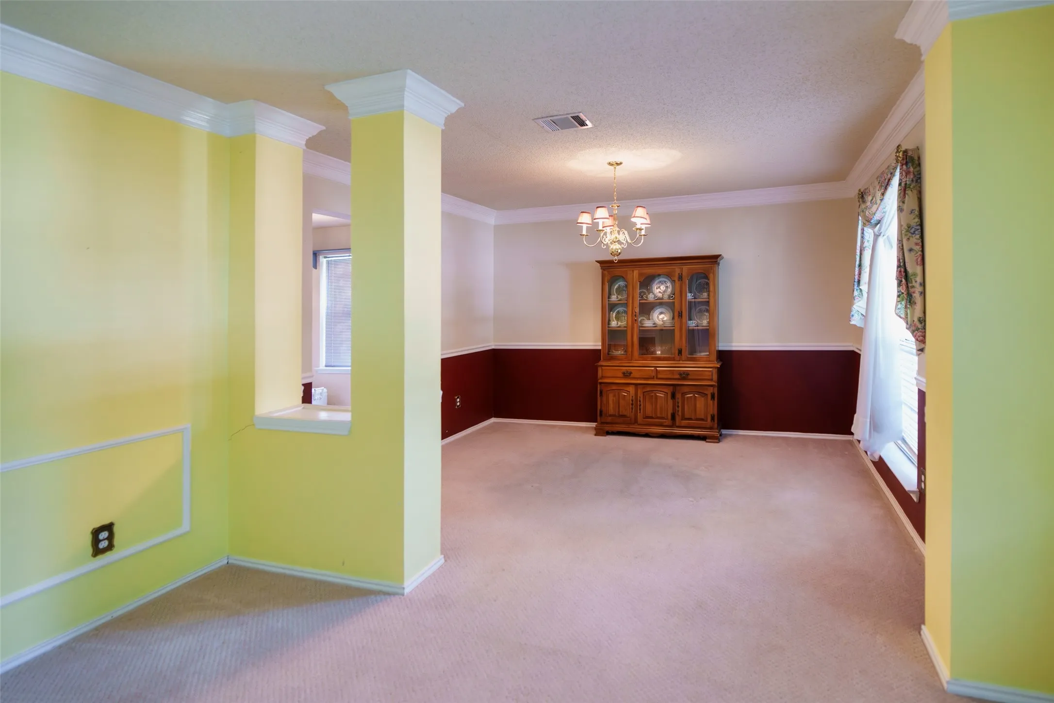Generous formal living room provides flexible space for entertaining, conversation, or a second family gathering area