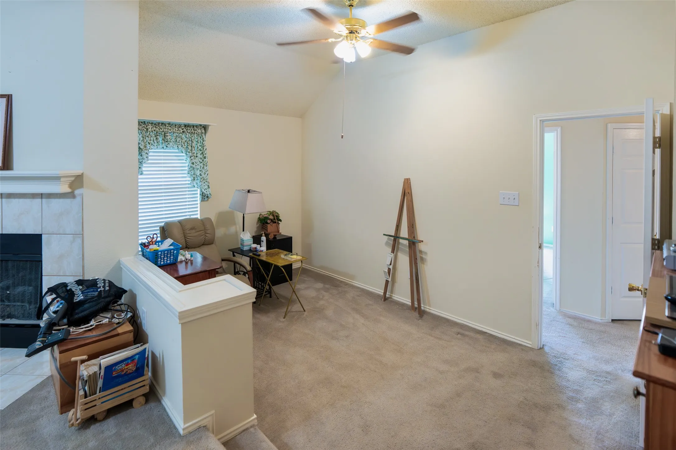 Inviting sitting area creates a private retreat within the primary suite