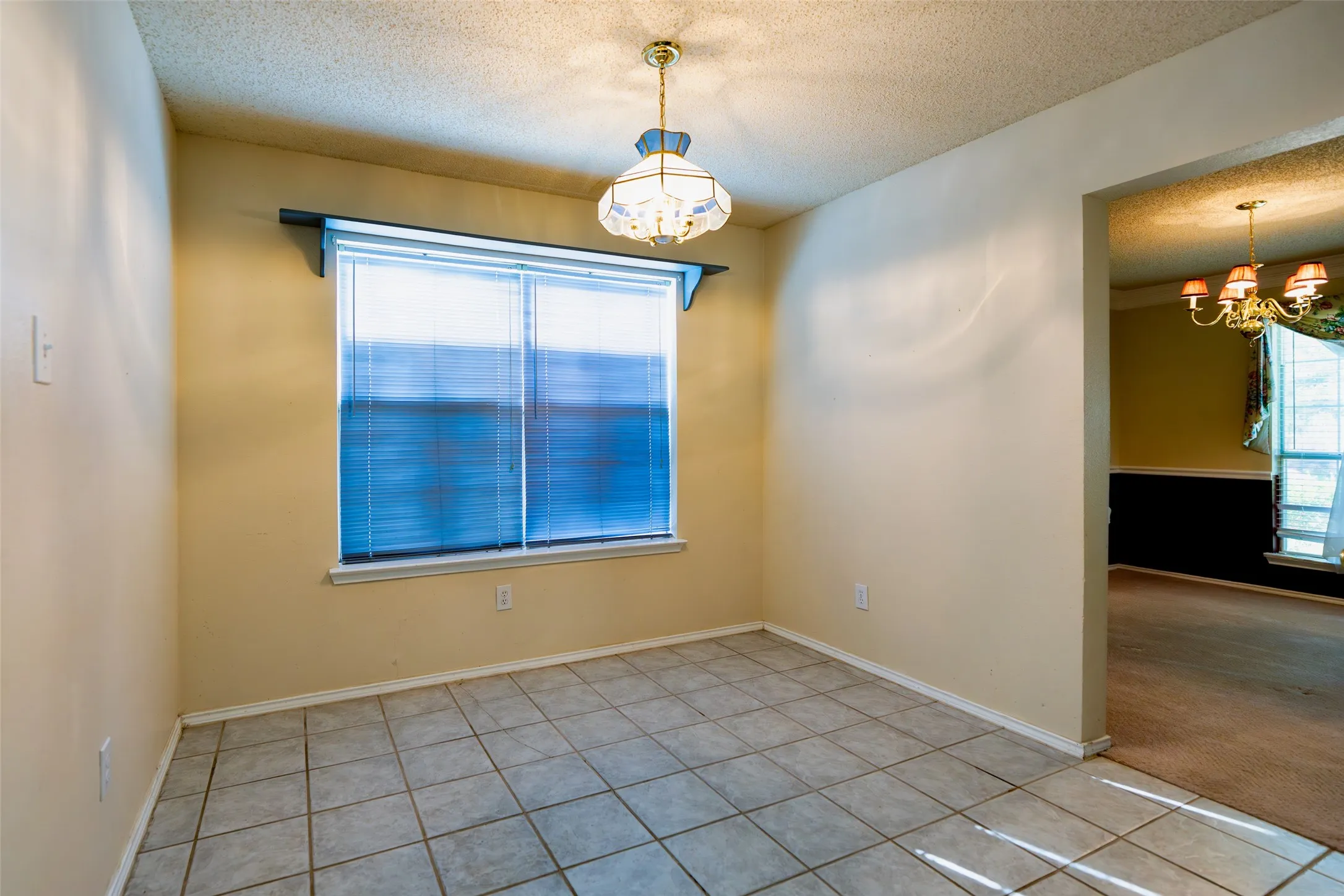 Breakfast nook conveniently located adjacent to the kitchen