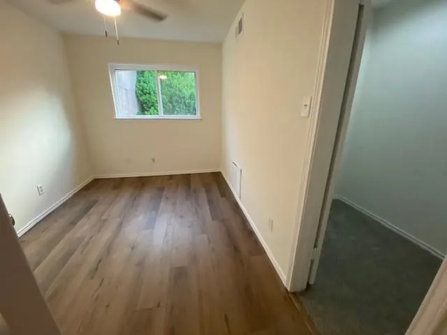 This room has a big walk-in closet or storage