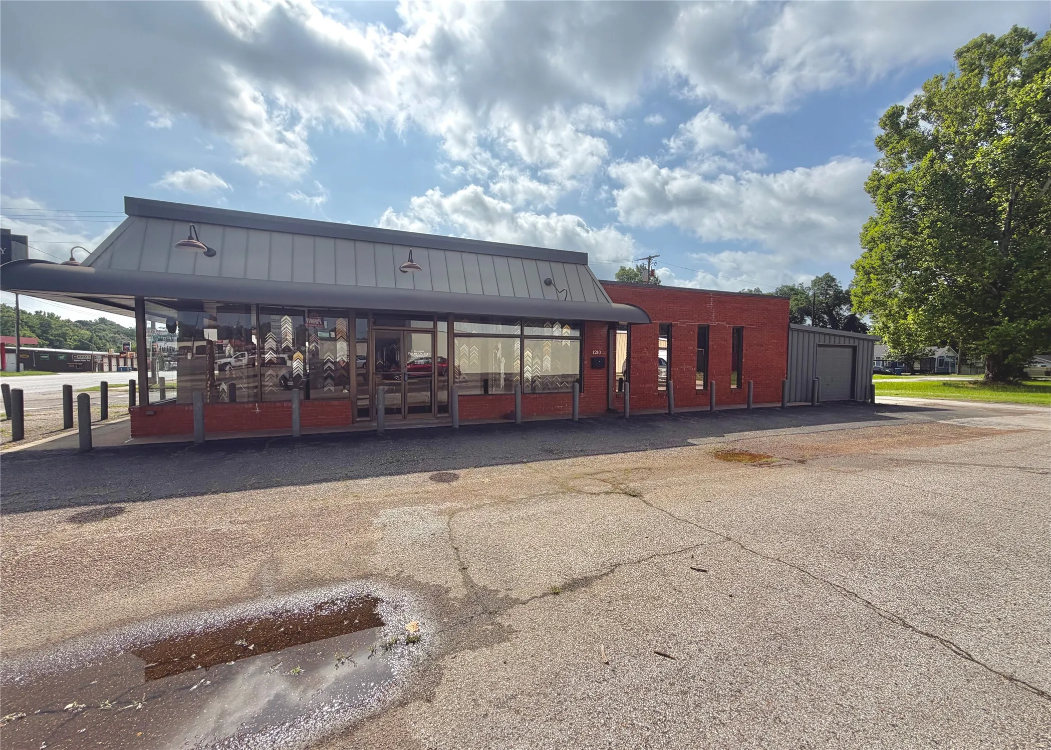 Commercial building featuring a prominent storefront with large display windows