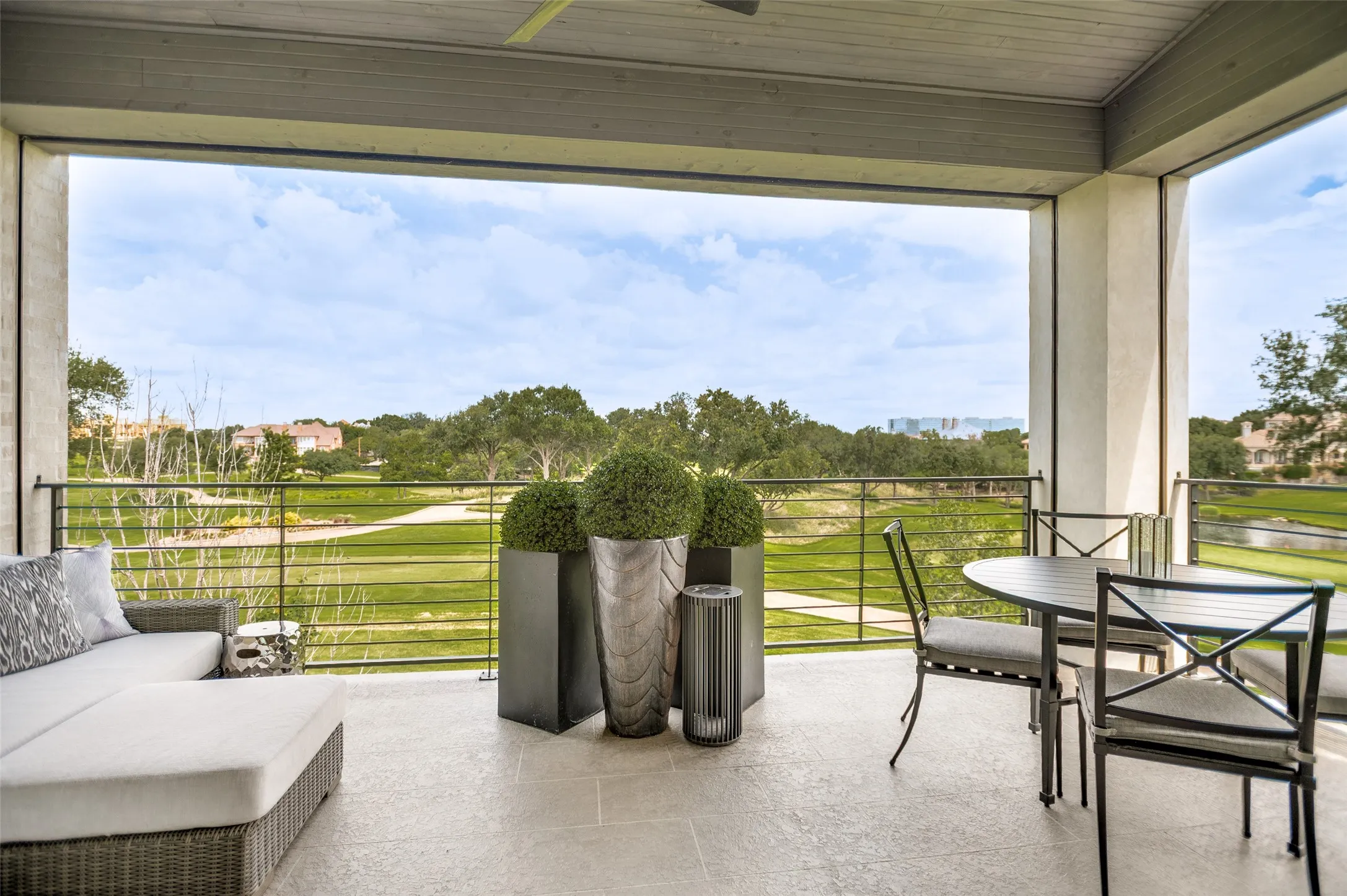 Relax on the private terrace where electric shades provide comfort and year-round enjoyment
