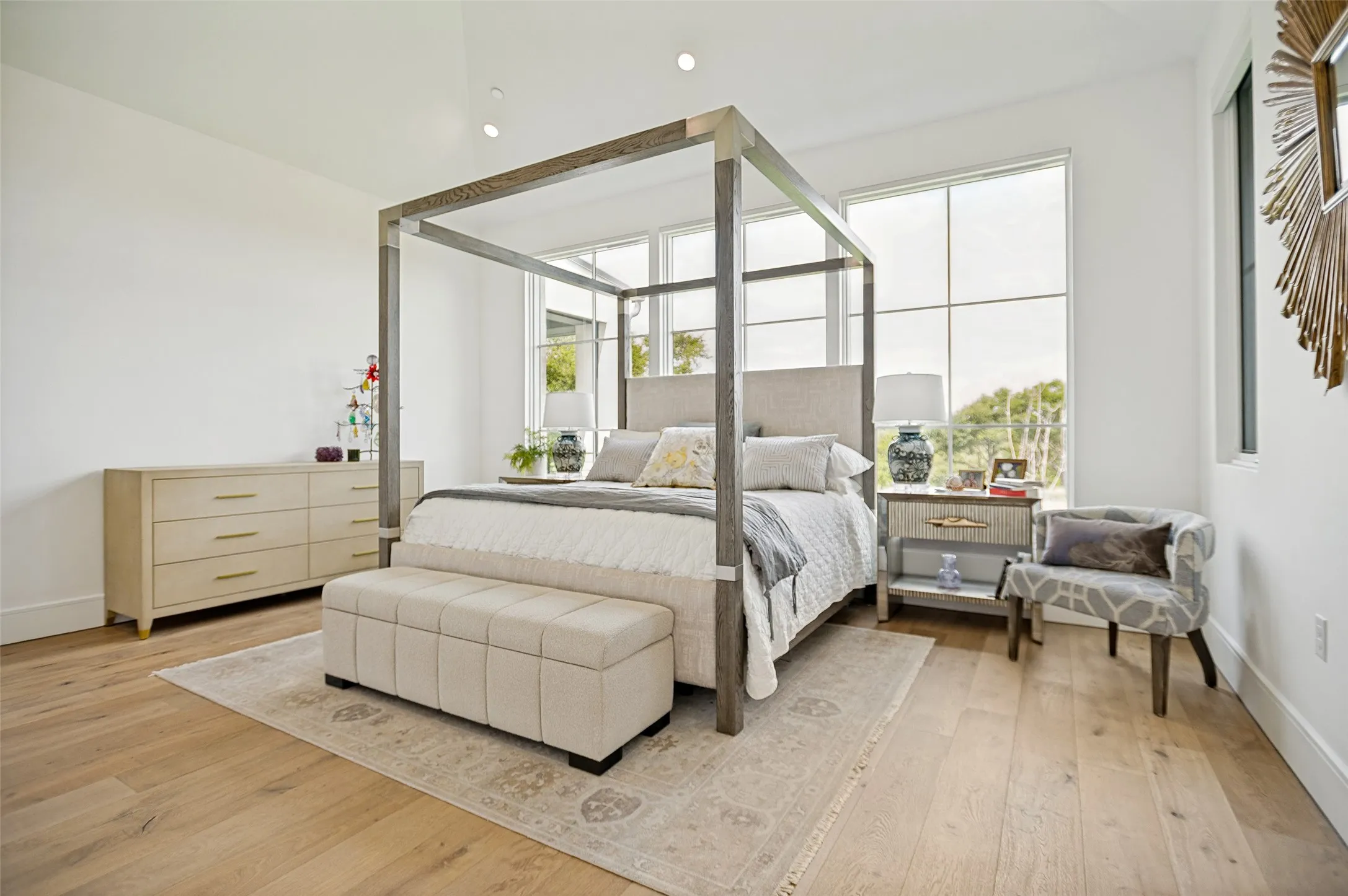 Custom Hunter-Douglas electric shades throughout