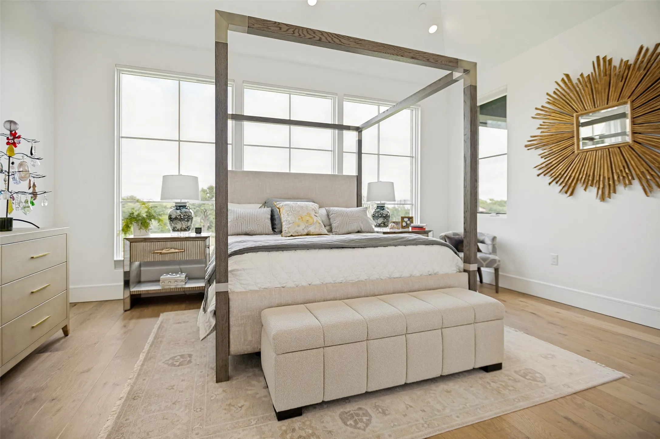Primary suite with expansive windows overlooking the 17th fairway